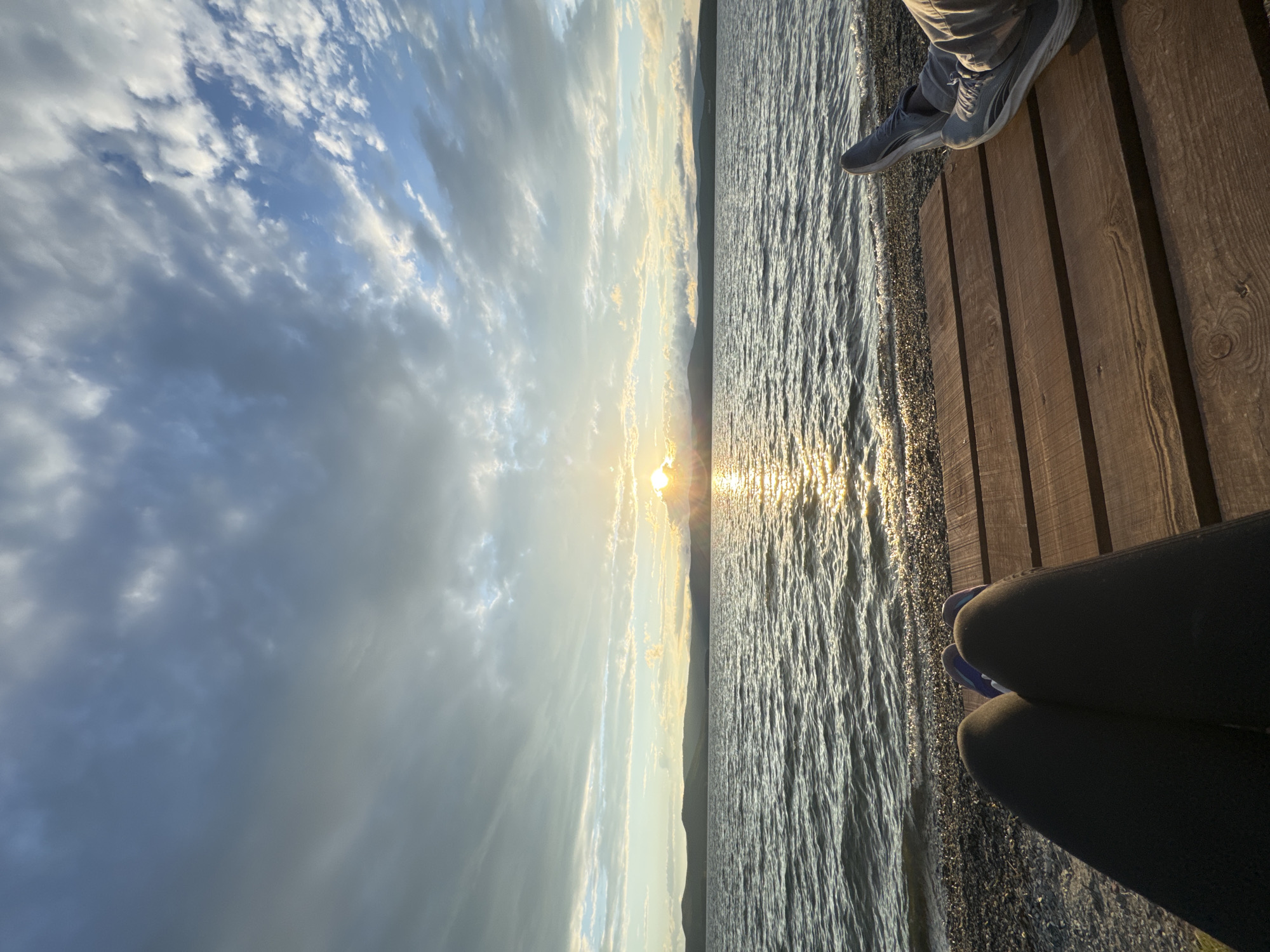 Sunset evening at Lake Turgoyak's shore and pier