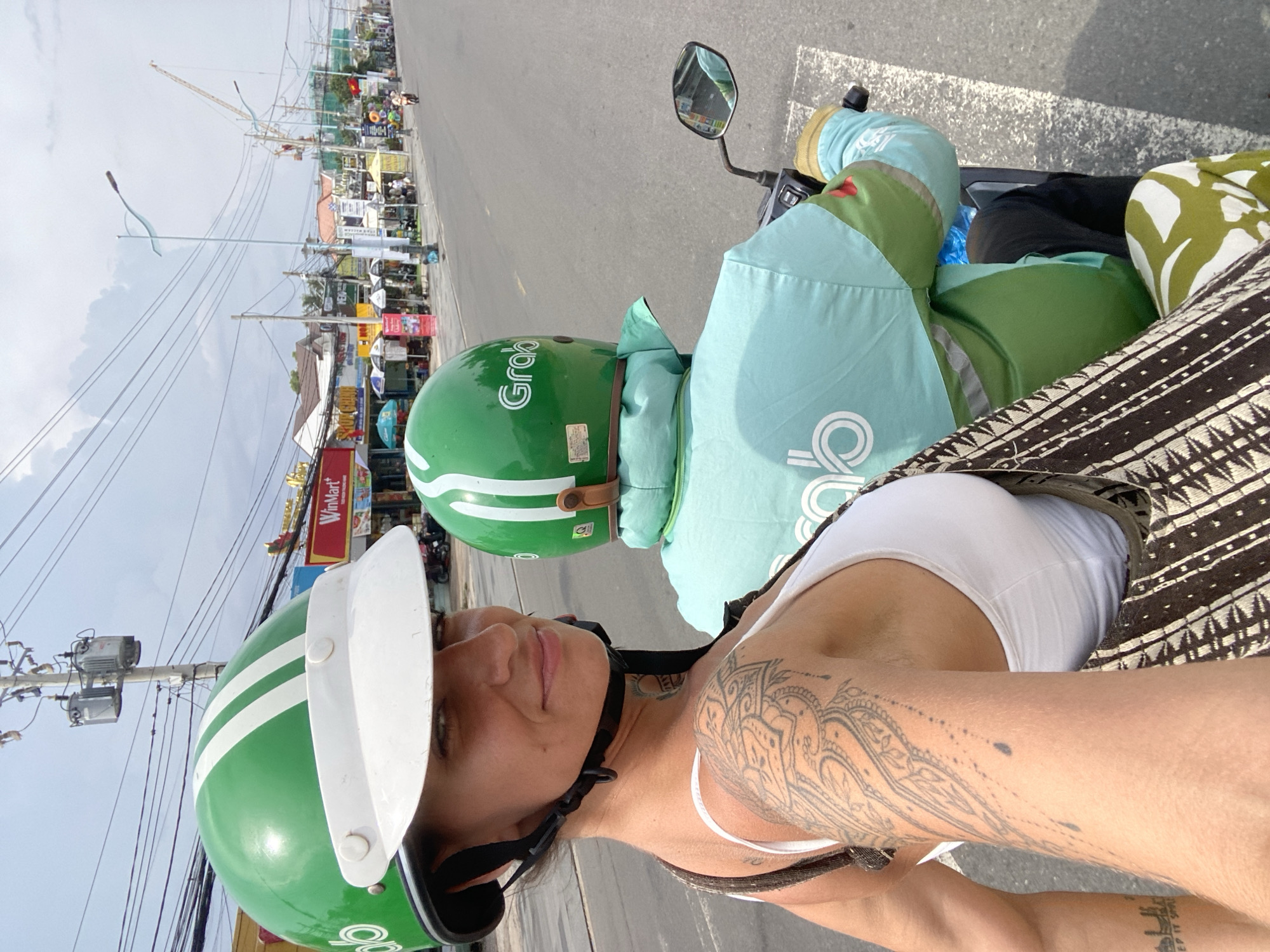 Motorcycle riders captured in selfies during morning commute in Vietnam
