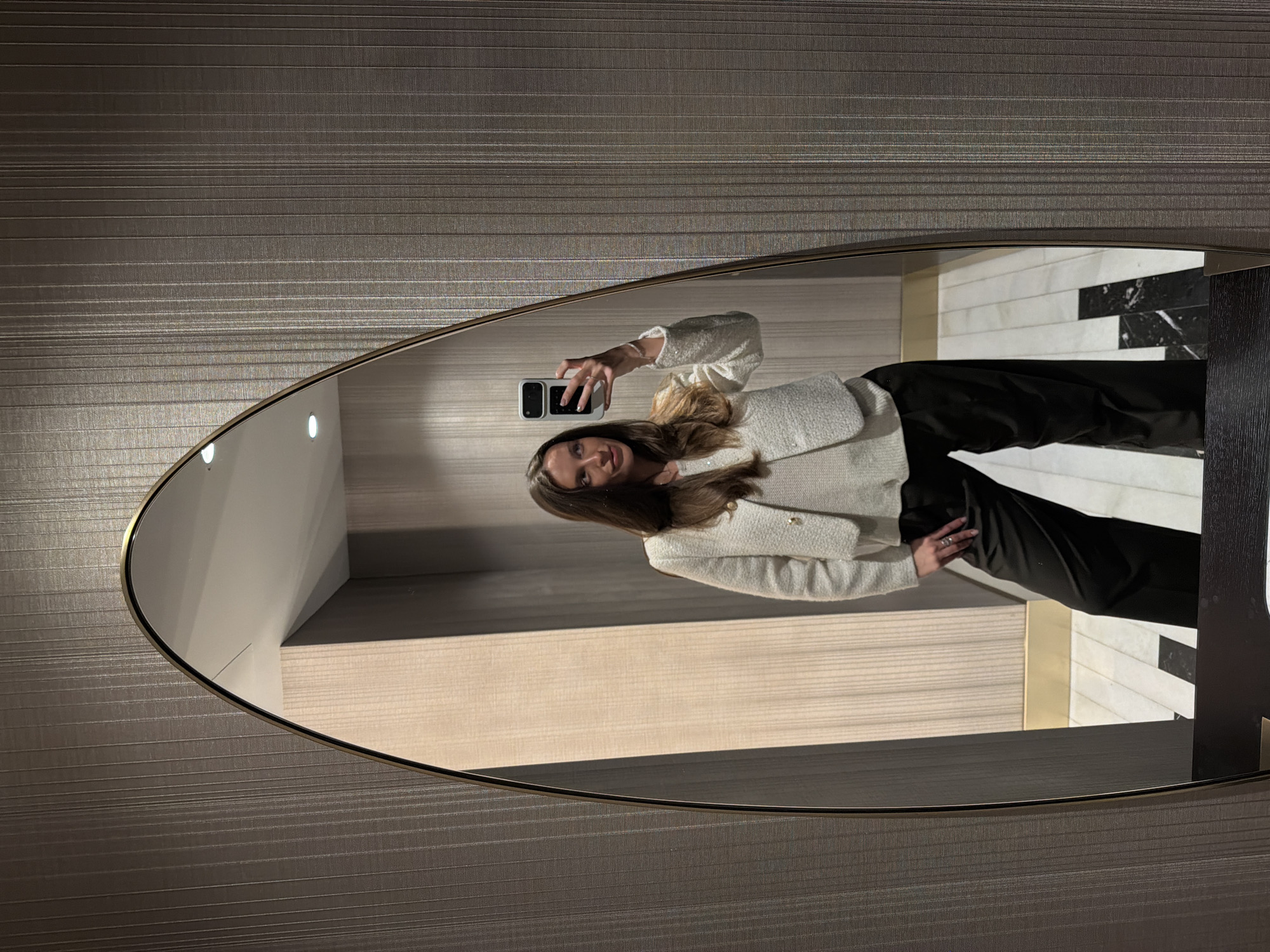 Woman Takes Mirror Selfies in Budva Hotel Room