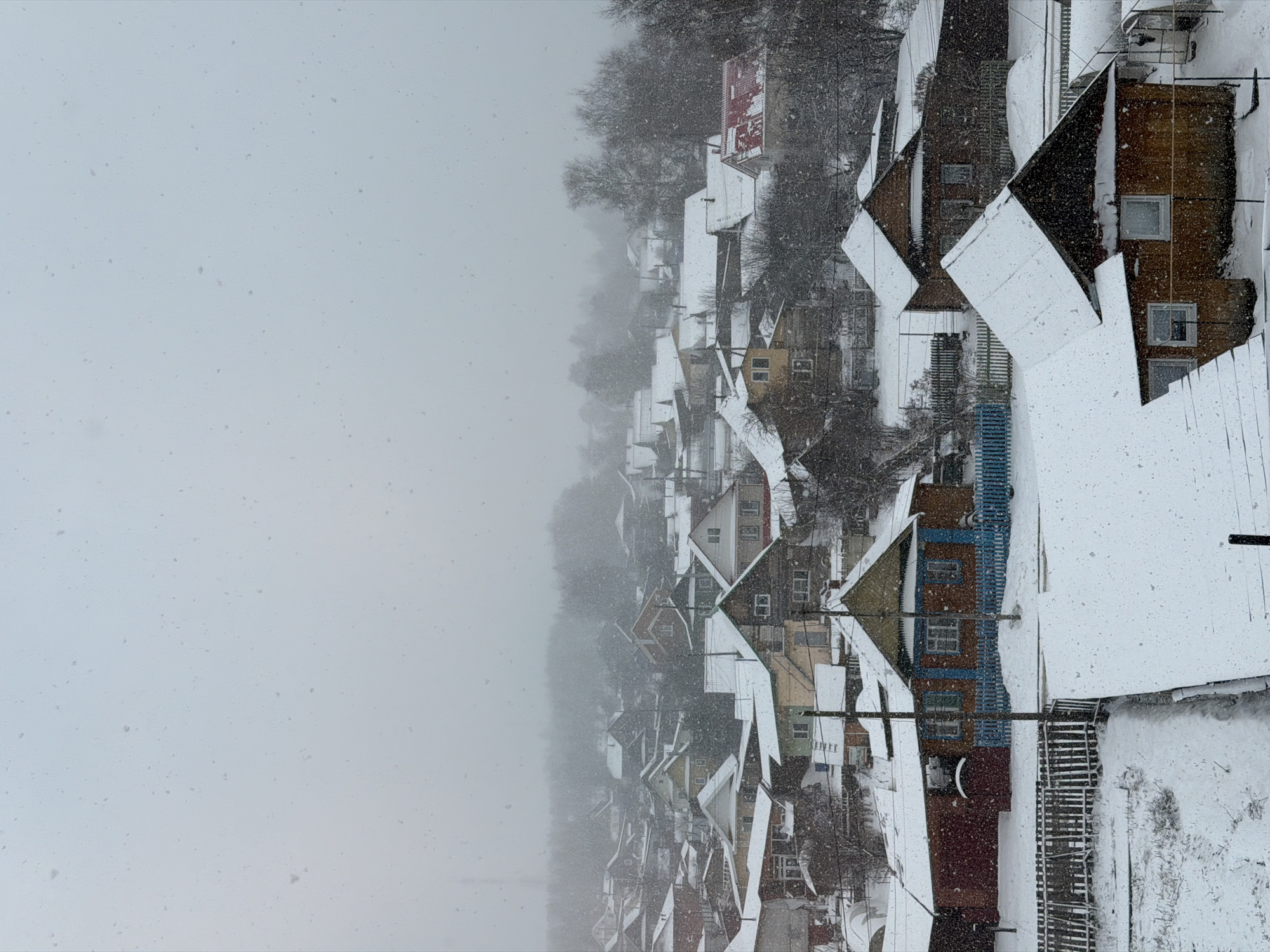 Spring snowfall blankets Chaikovsky as locals document weather, celebrate indoors