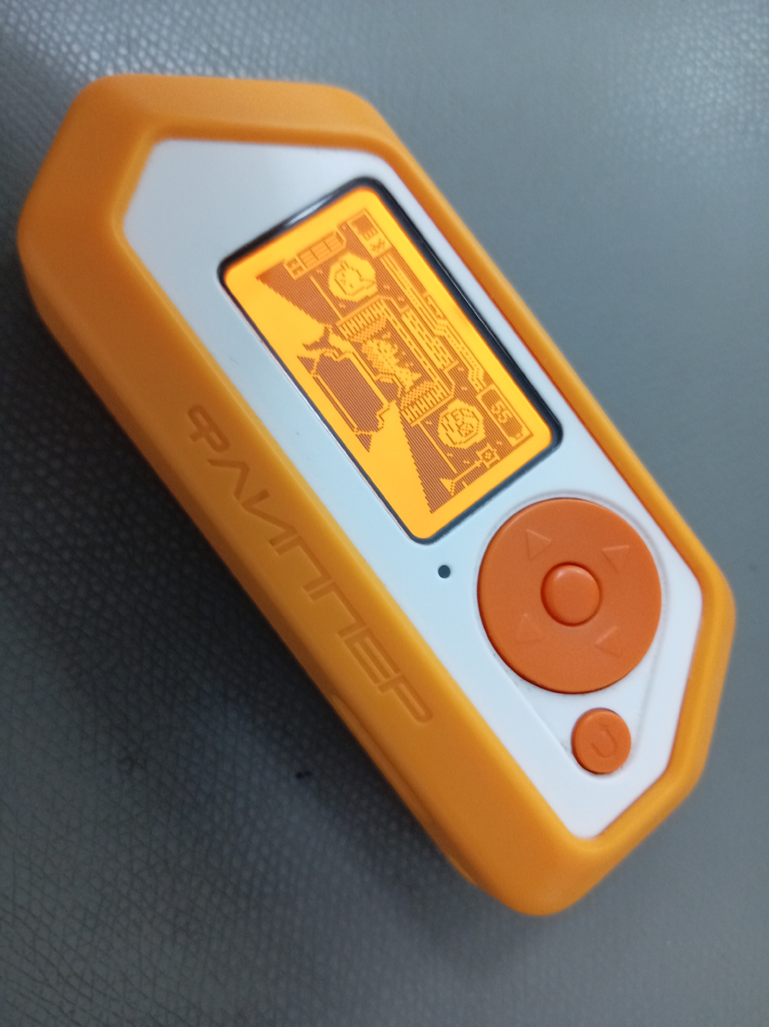 Person operates orange electronic device showing flight tracking data