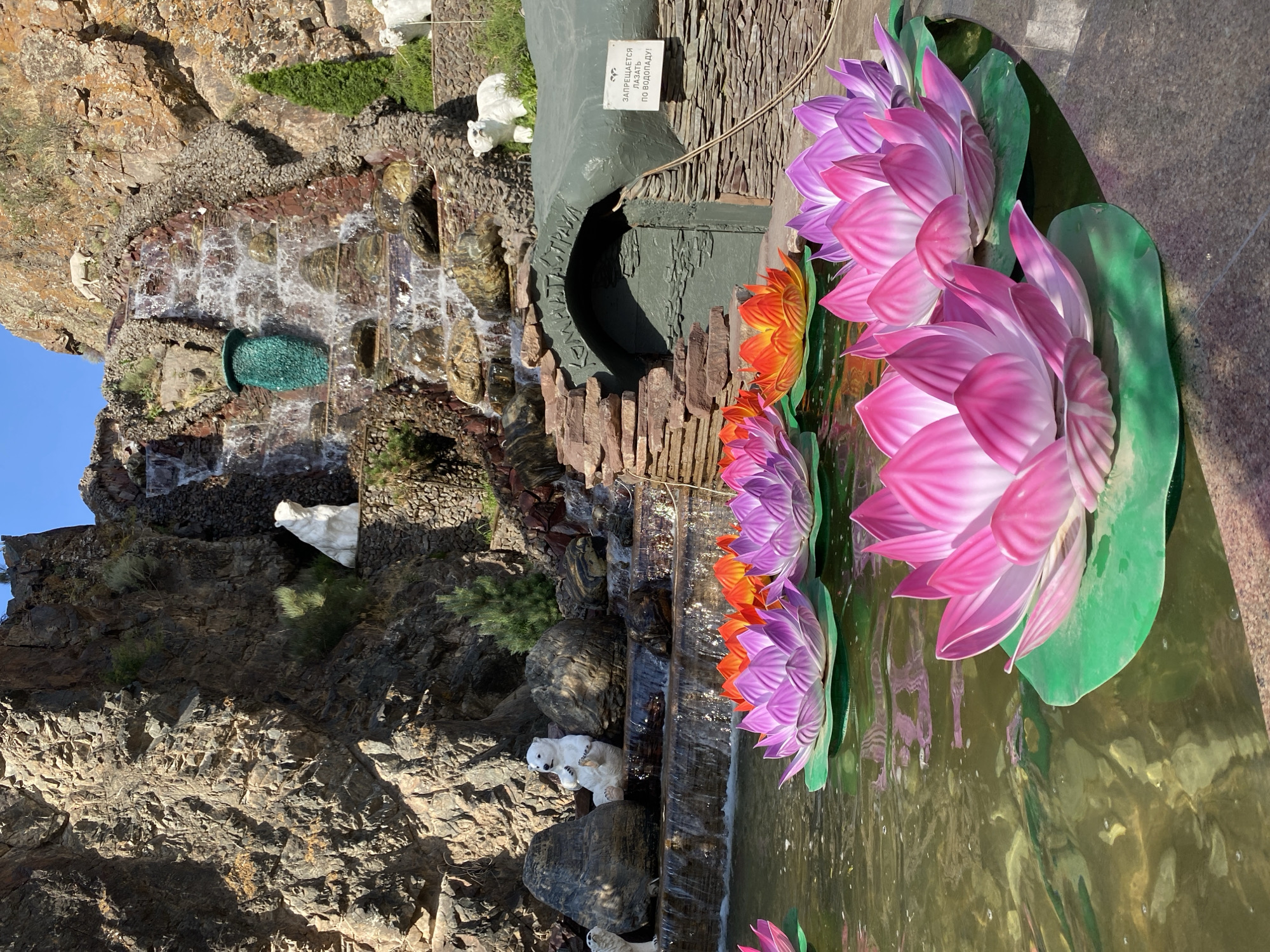 Decorative waterfall and landscaped grounds in Arashan, Kyrgyzstan