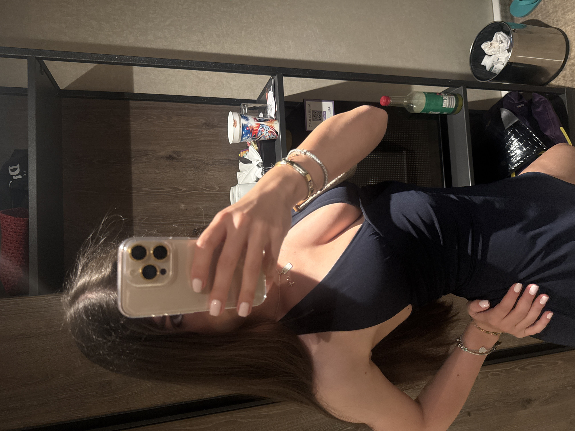 Getting ready in a Budapest hotel, mirror selfie in navy blue