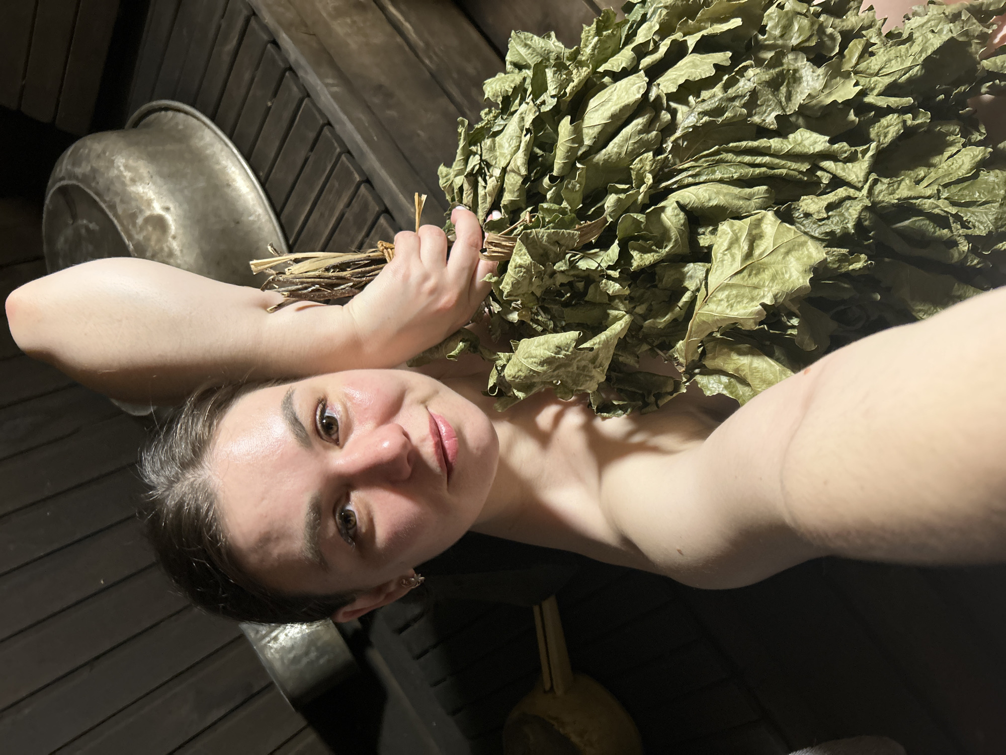 Woman enjoys traditional banya experience in Chaikovsky, Russia