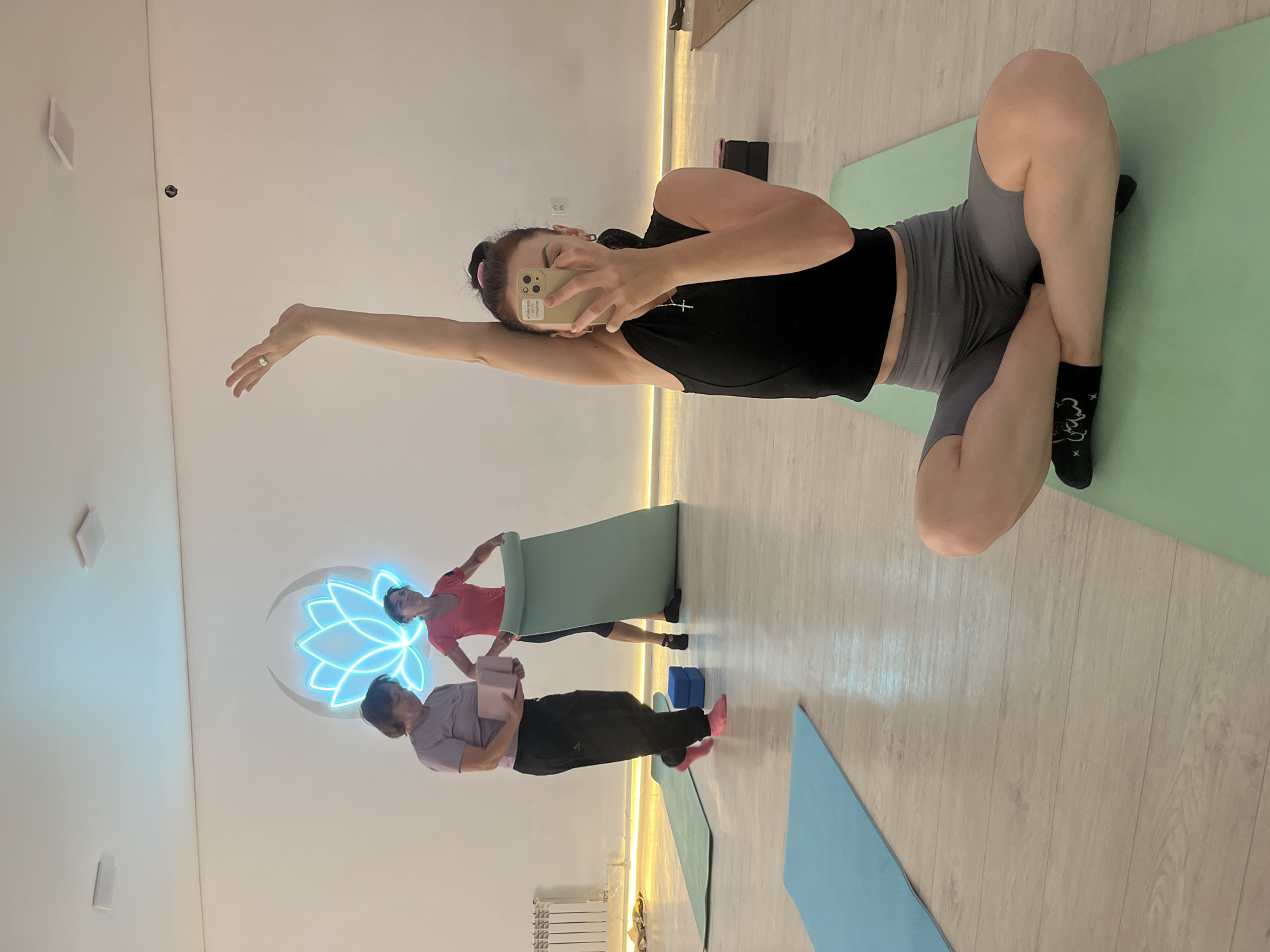 Yoga session selfie at an Aksu studio