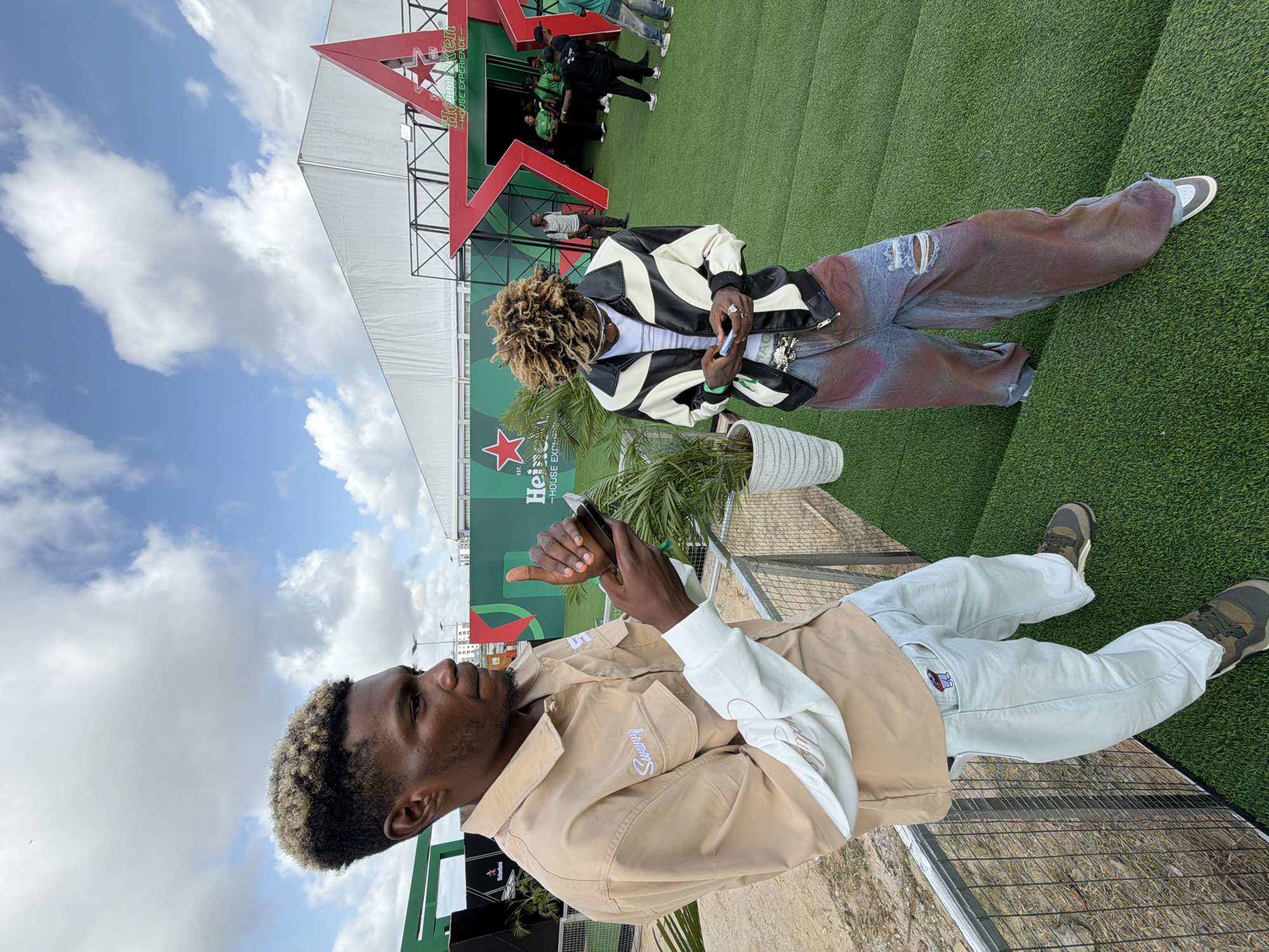 Two young men spotted at outdoor event in Lagos