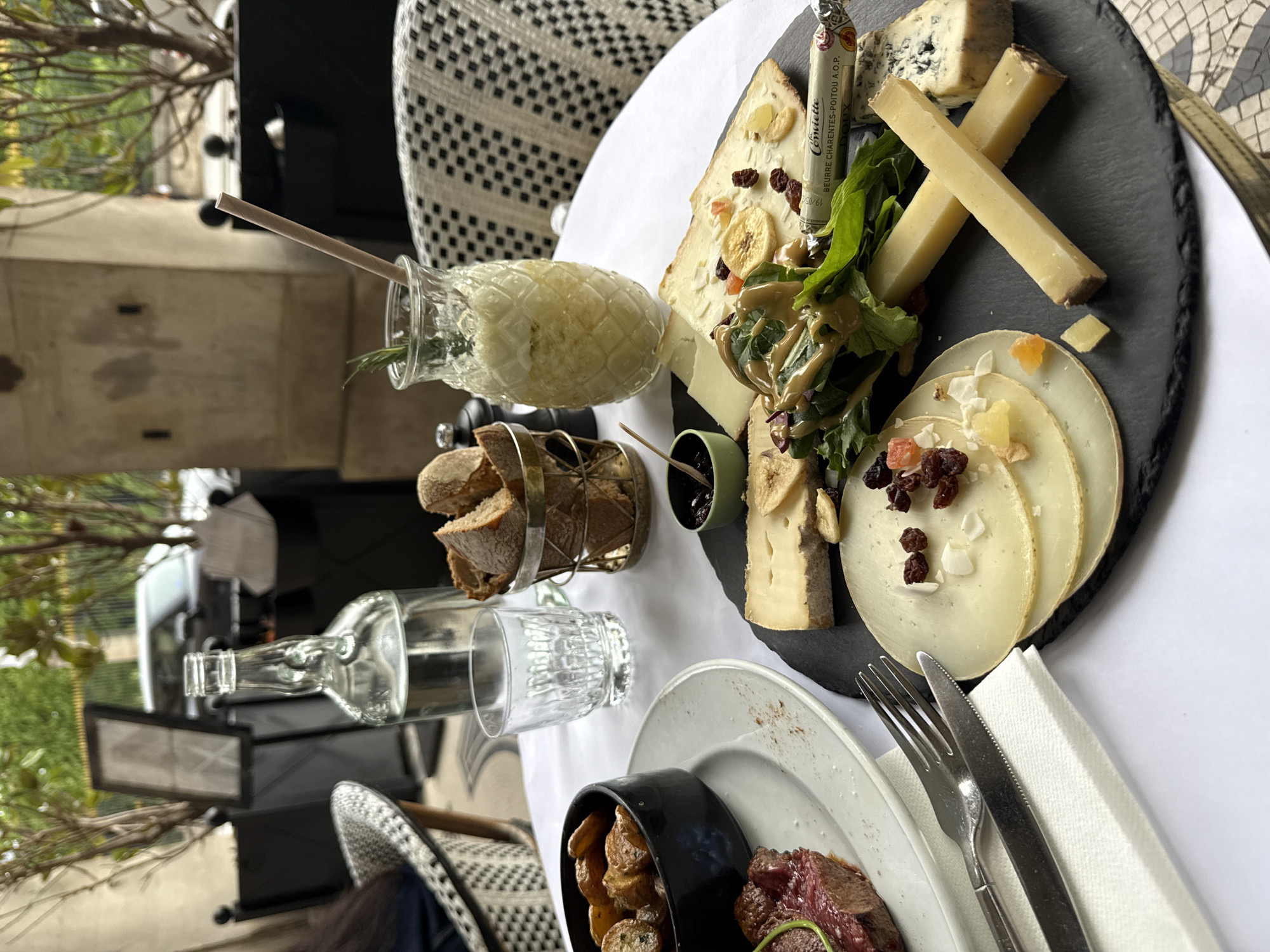 Parisian café captured in afternoon dining scene