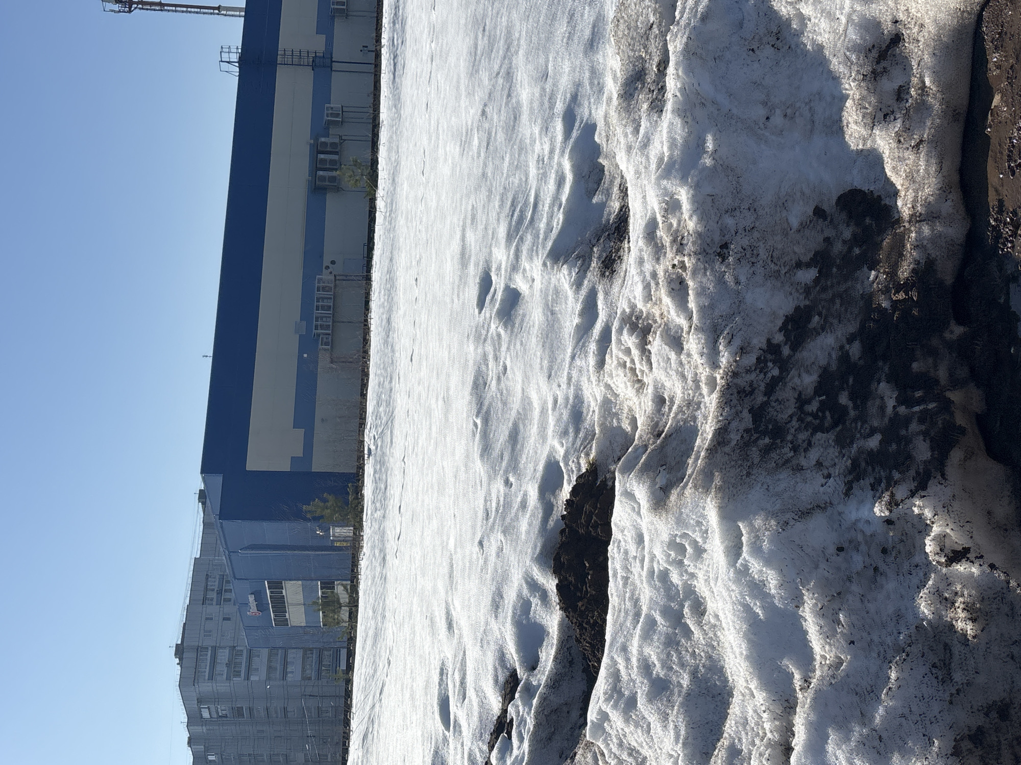 Daily life moments captured across Chaikovsky, Russia during spring thaw