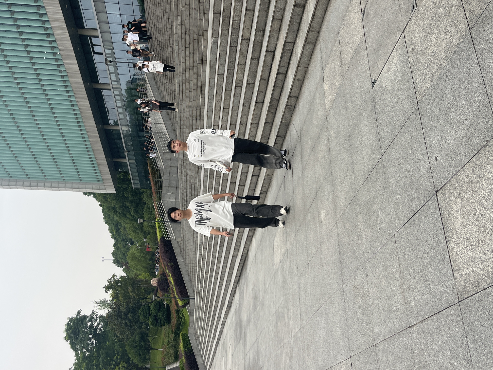 Everyday life around a Jiangjin park, scooters and all