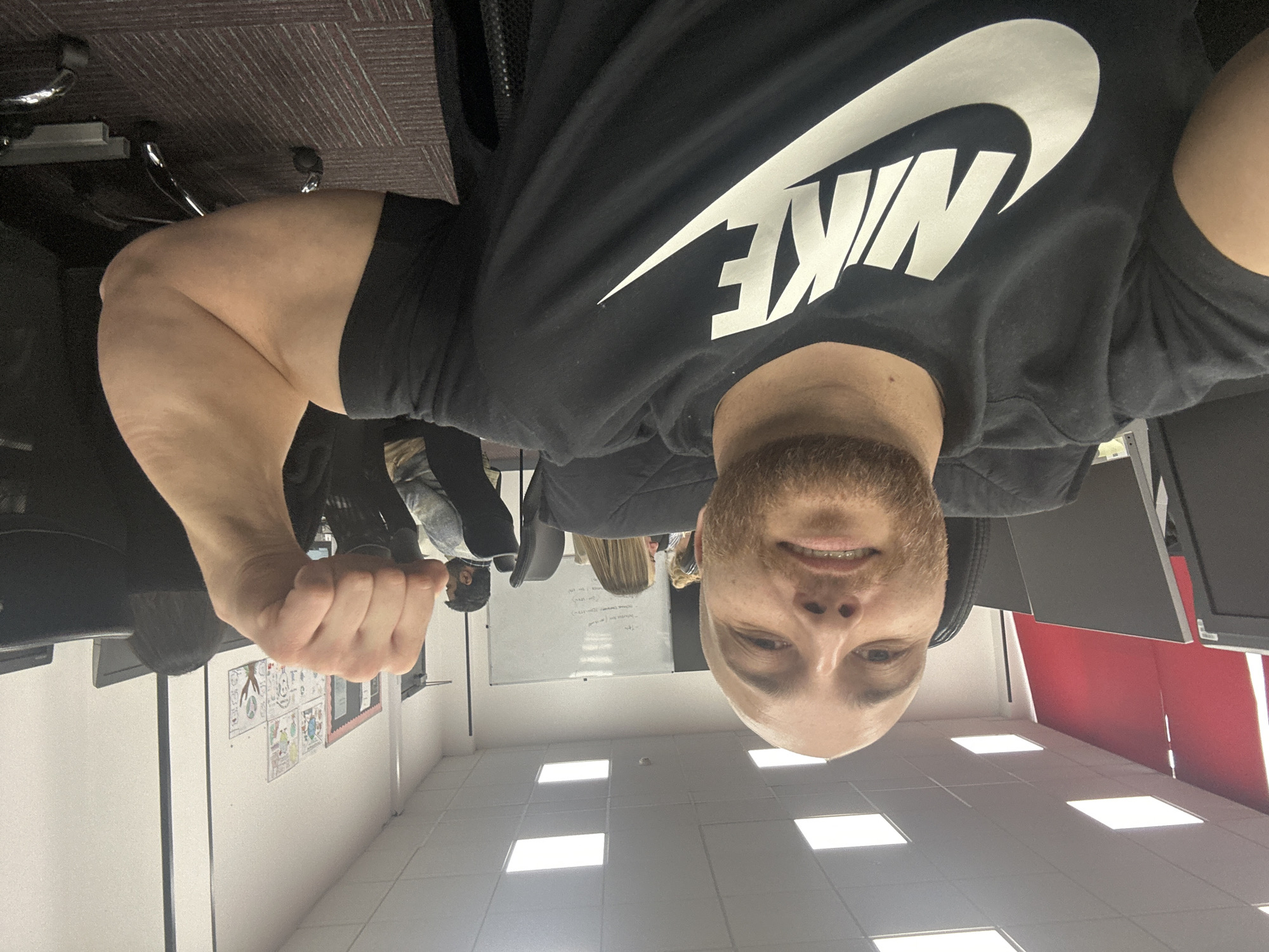 Office worker takes flexing selfie at London workplace