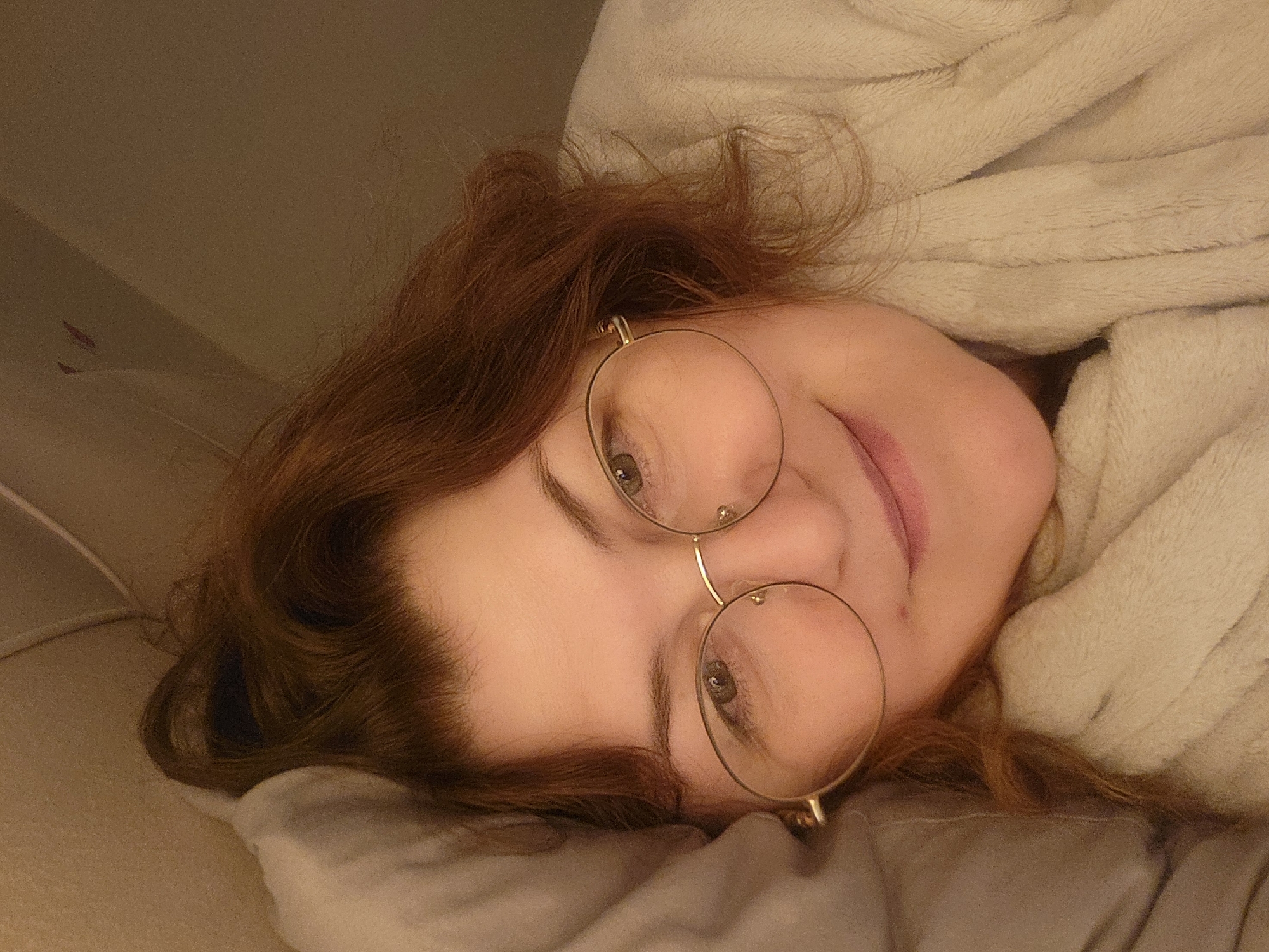Dimly lit bedtime selfie in Saint Petersburg