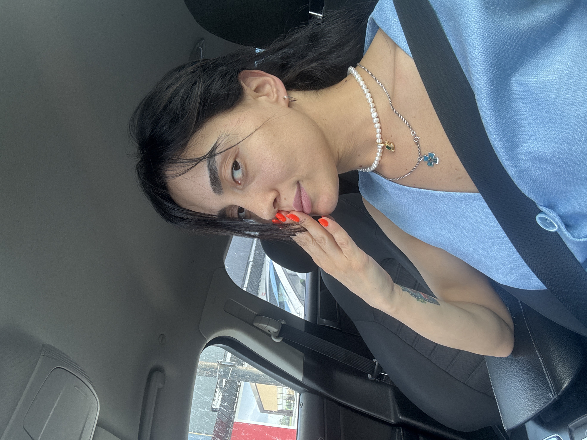 Car selfie session during Tbilisi traffic, midday June 2026
