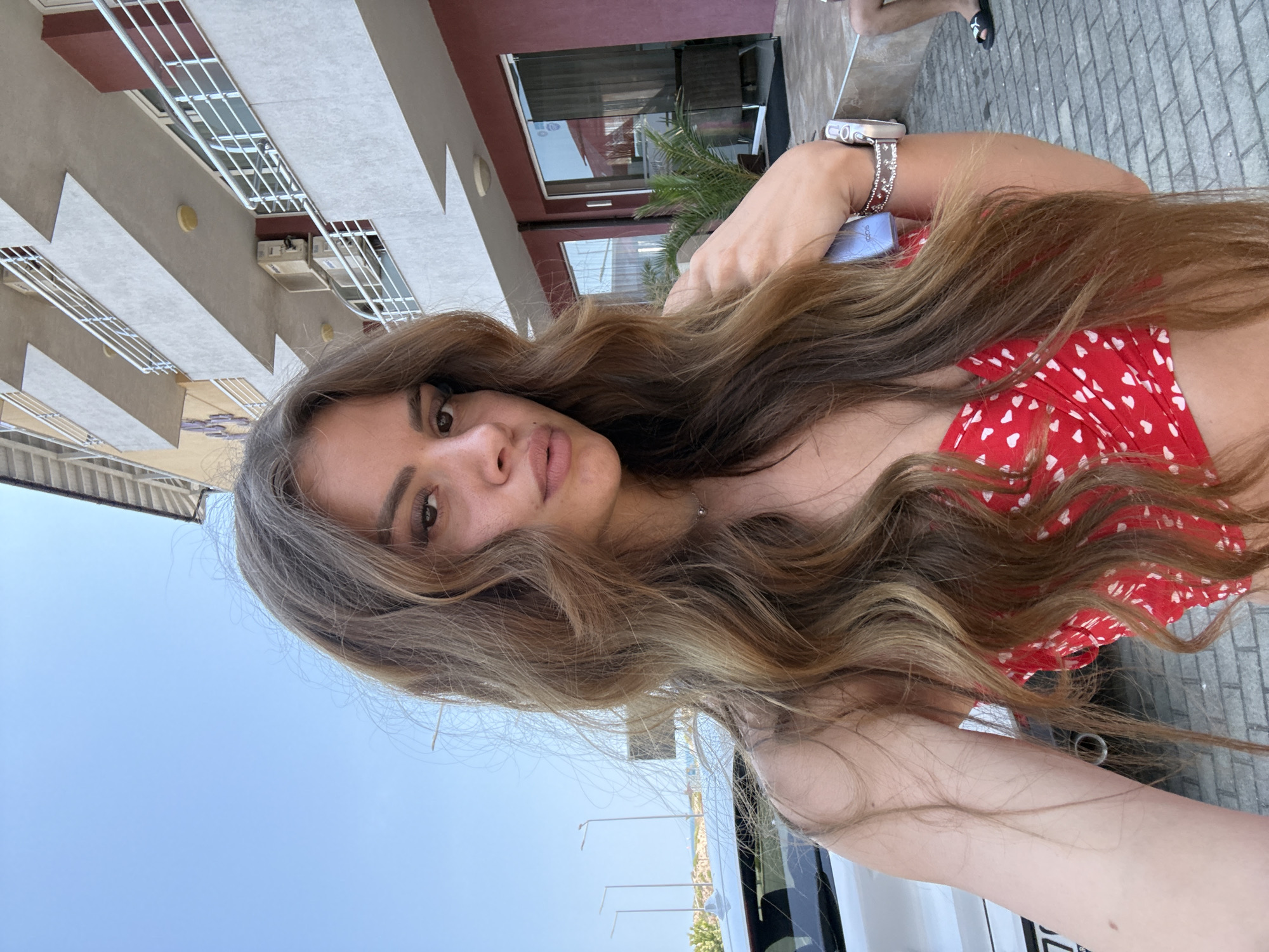 Sunny morning selfies outside a Primorsko hotel, Black Sea coast