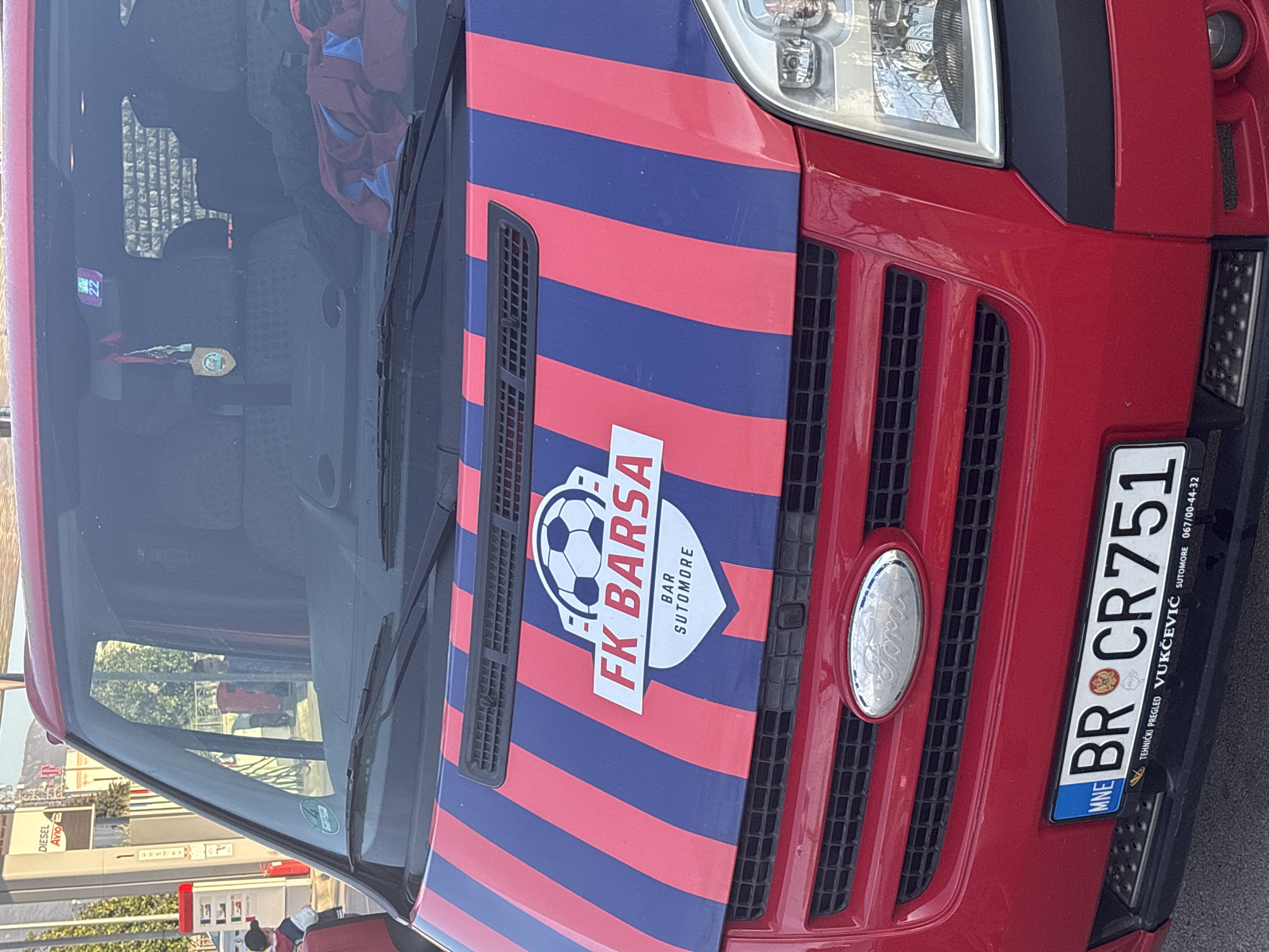 Spring scenes documented in Bar, Montenegro football van and blossoms