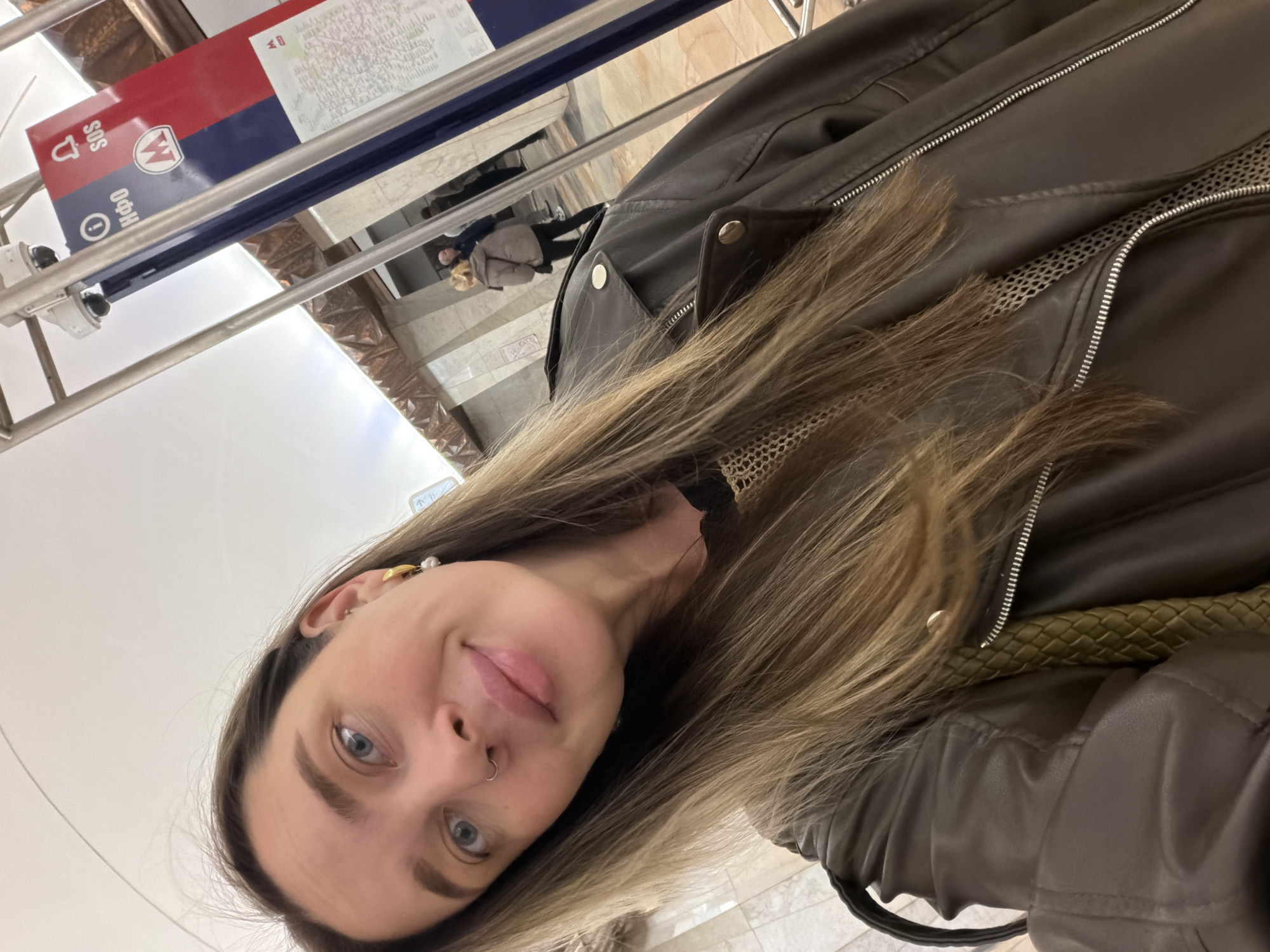 Woman Takes Selfie in Moscow Subway Station
