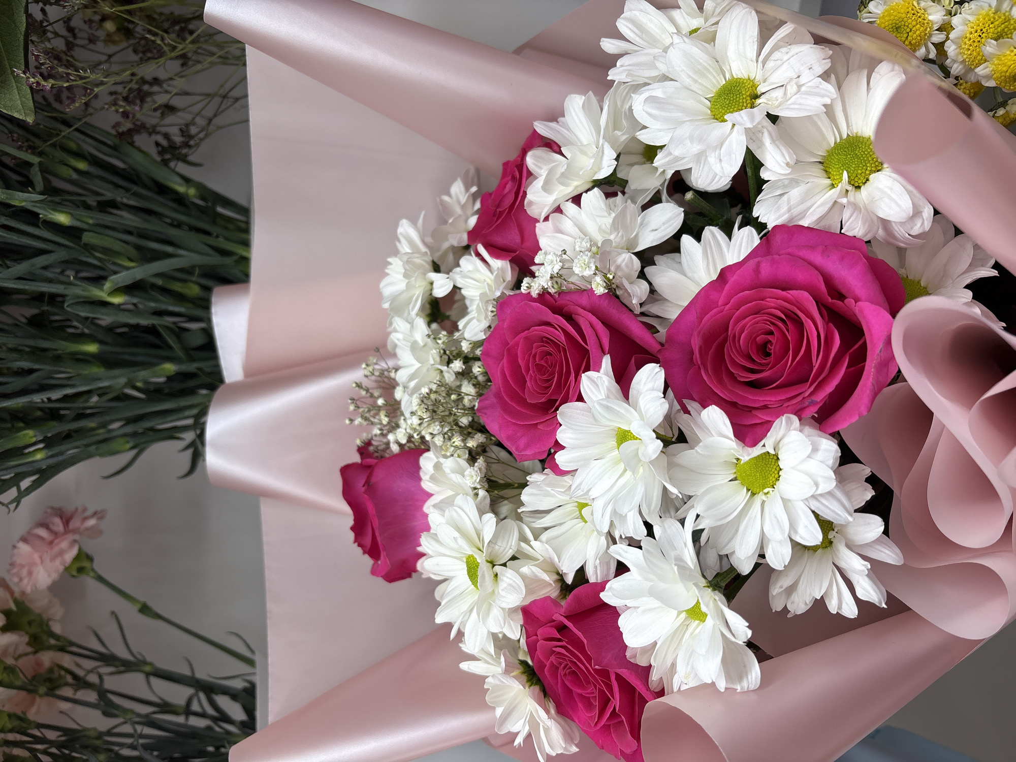 Flower bouquets displayed in Bolsheustyikinskoye, Russia