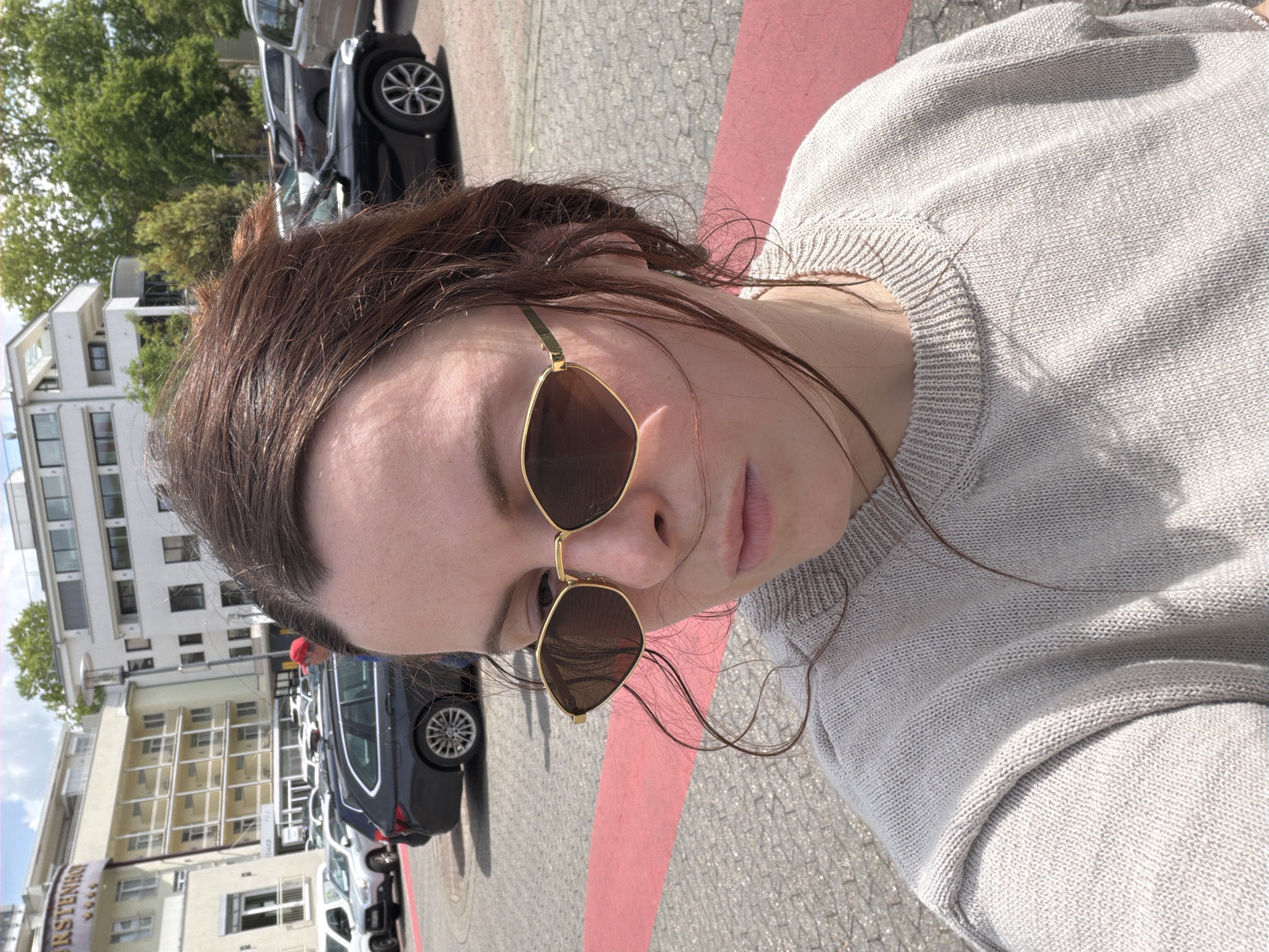 Woman takes selfie in Bad Kreuznach parking area