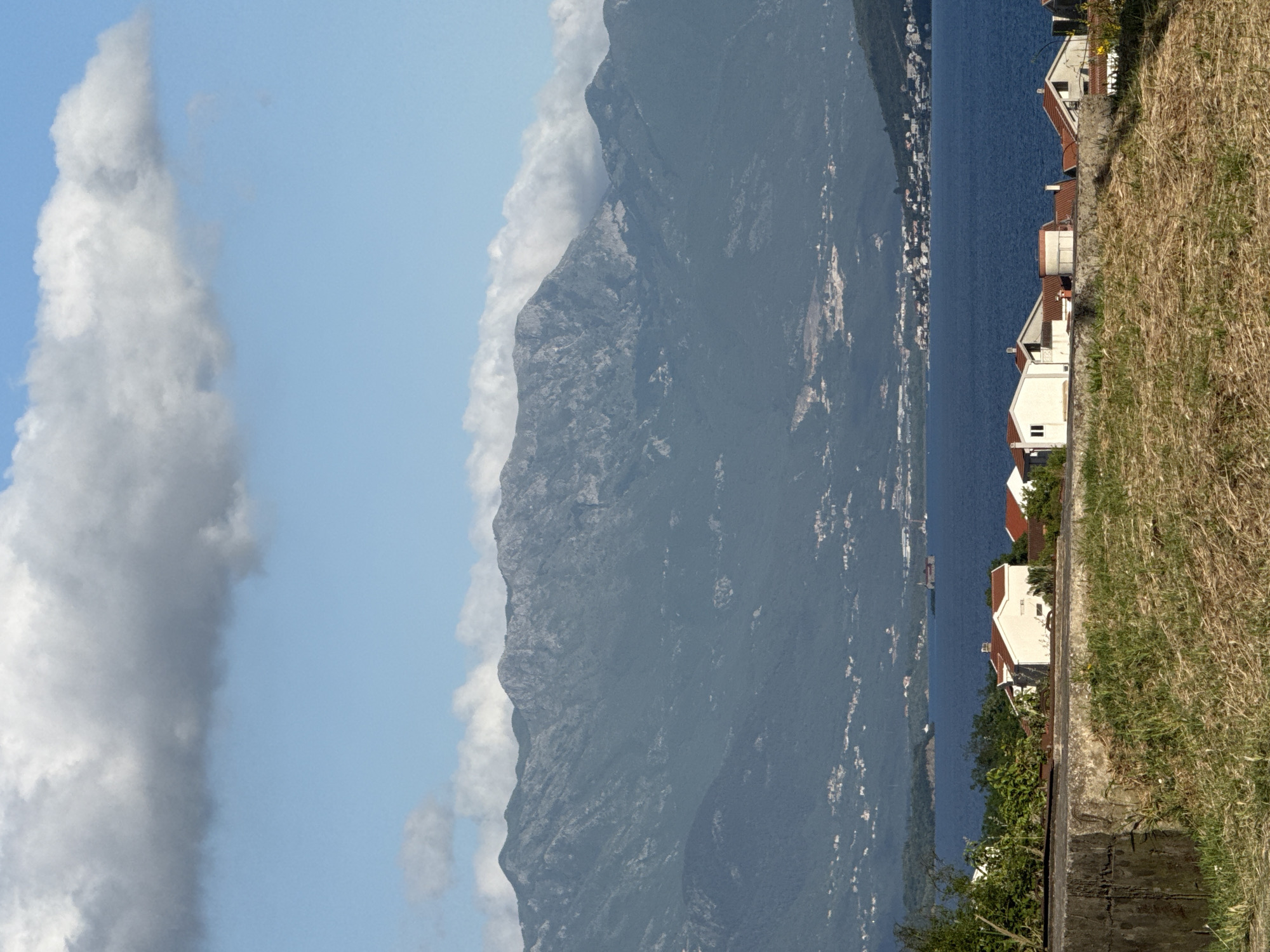 Mountain peak shrouded in clouds observed along Montenegro coast