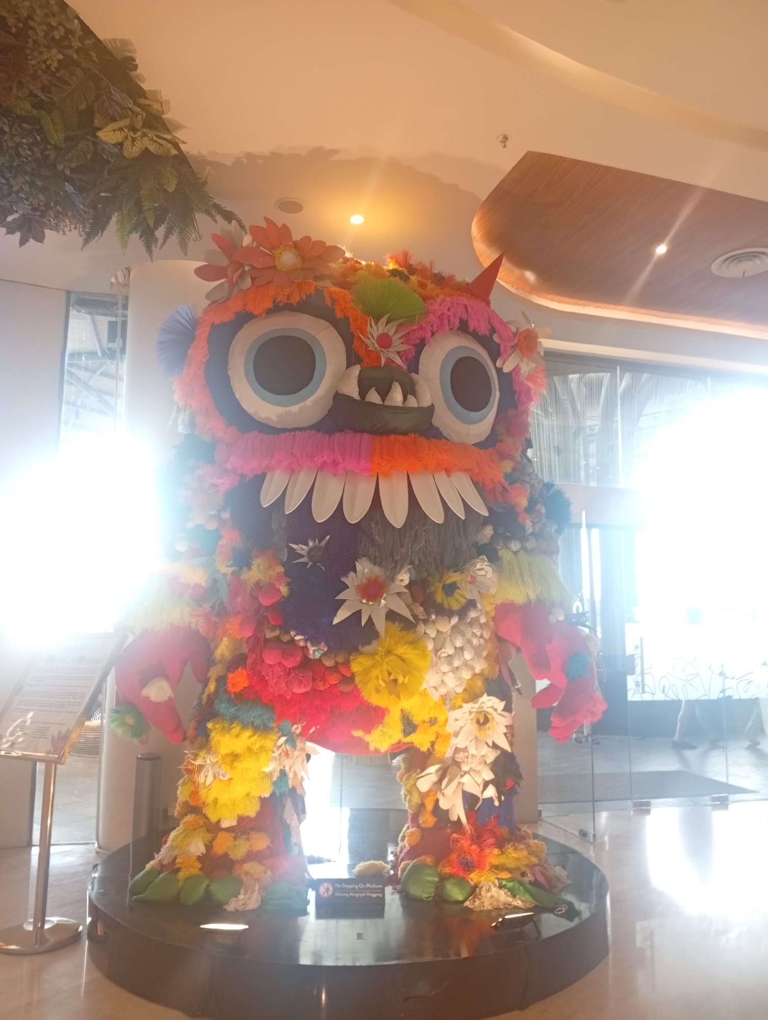 Morning documentation of Denpasar shopping mall interior and art displays