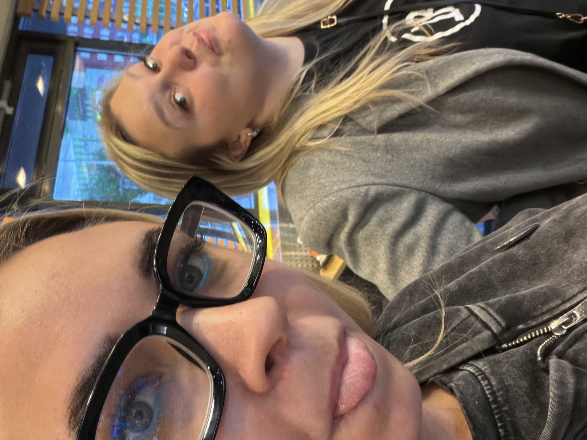 Two women pose for selfie in Izhevsk, Russia