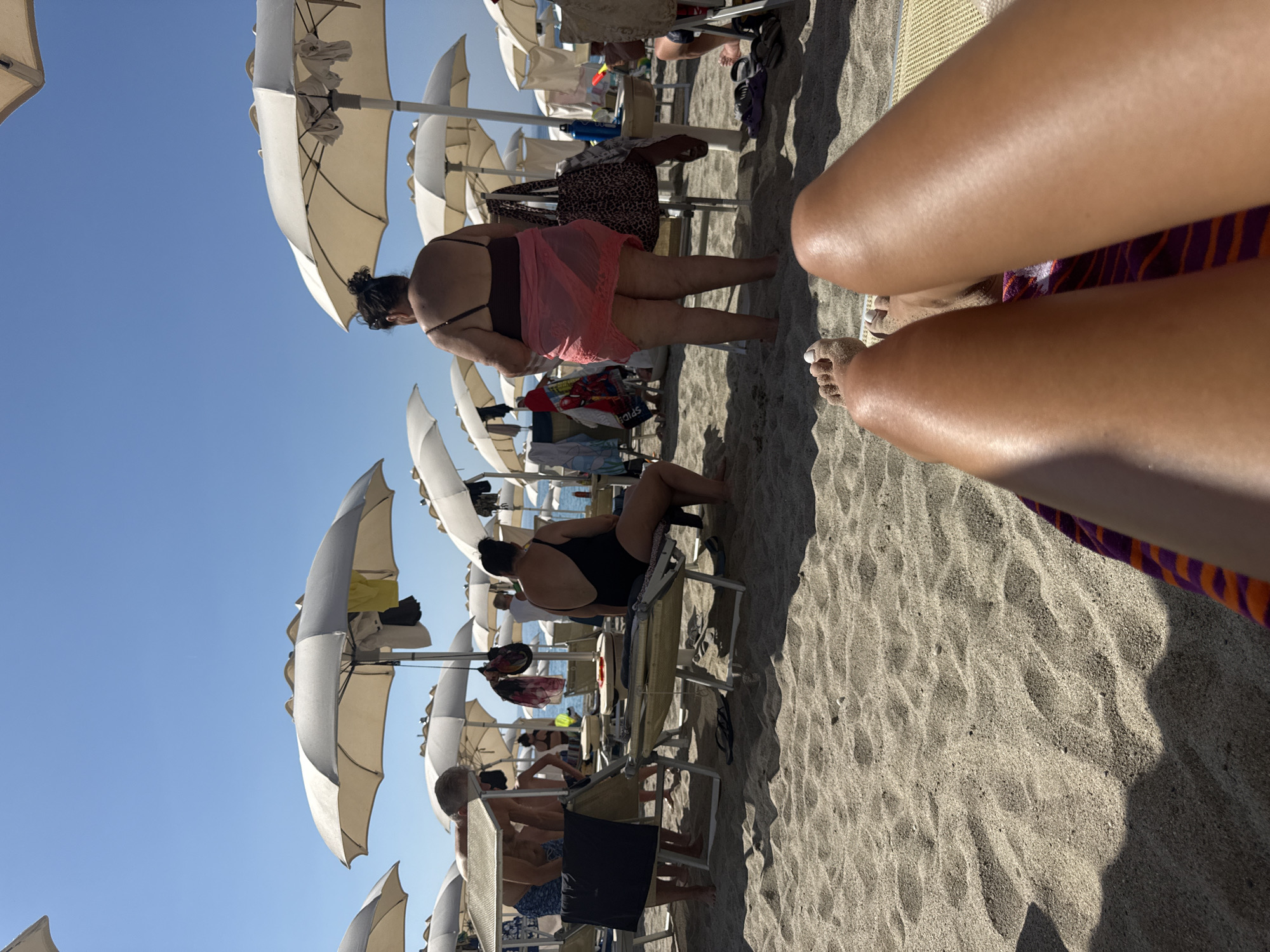 Slow beach morning in Finale Ligure, sunscreen and all
