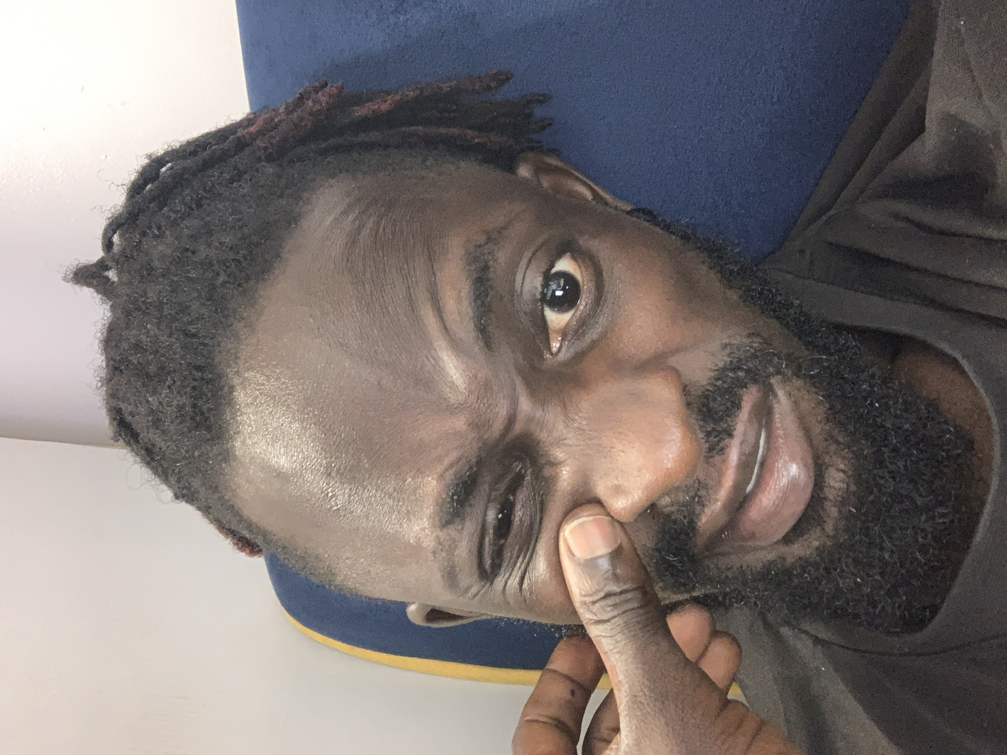 Man with dreadlocks photographed in close-up portraits in Lekki