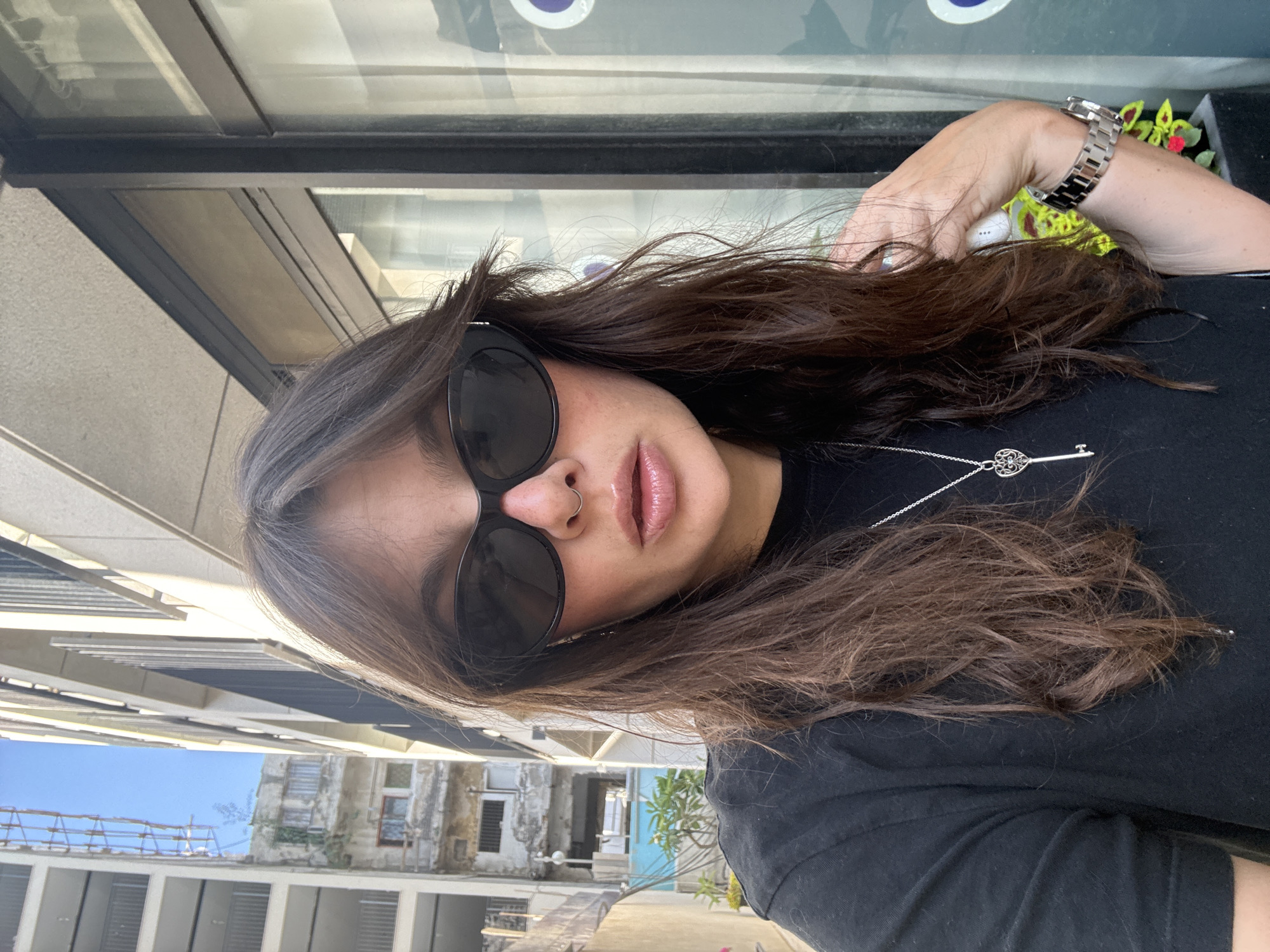 Woman takes mirror selfies in Tel Aviv elevator