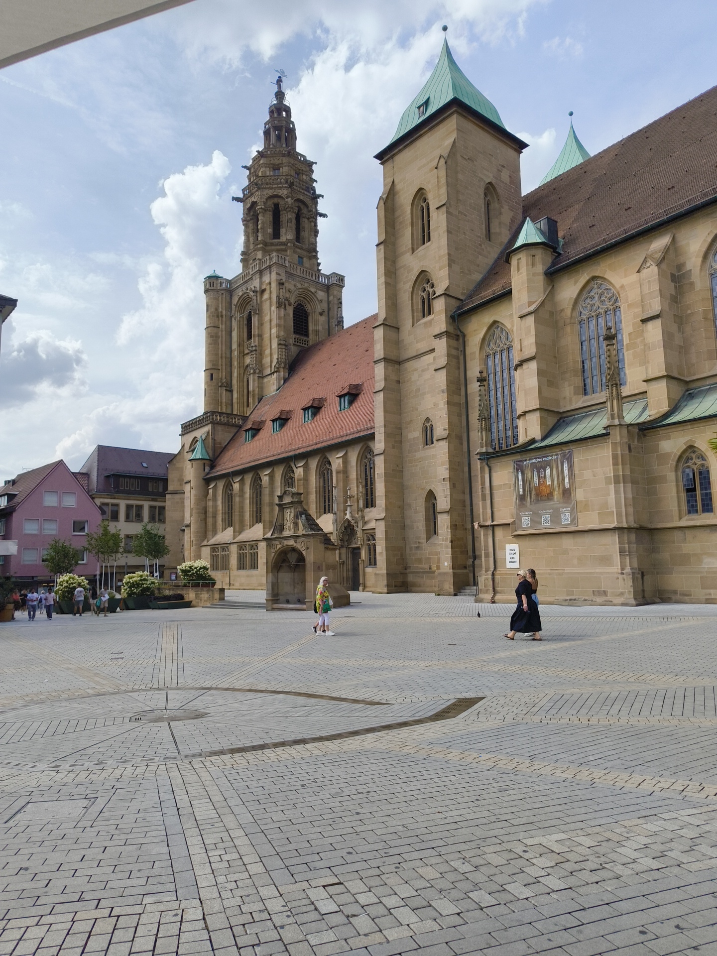 Heilbronn's Gothic church and historic Rathaus, midday.