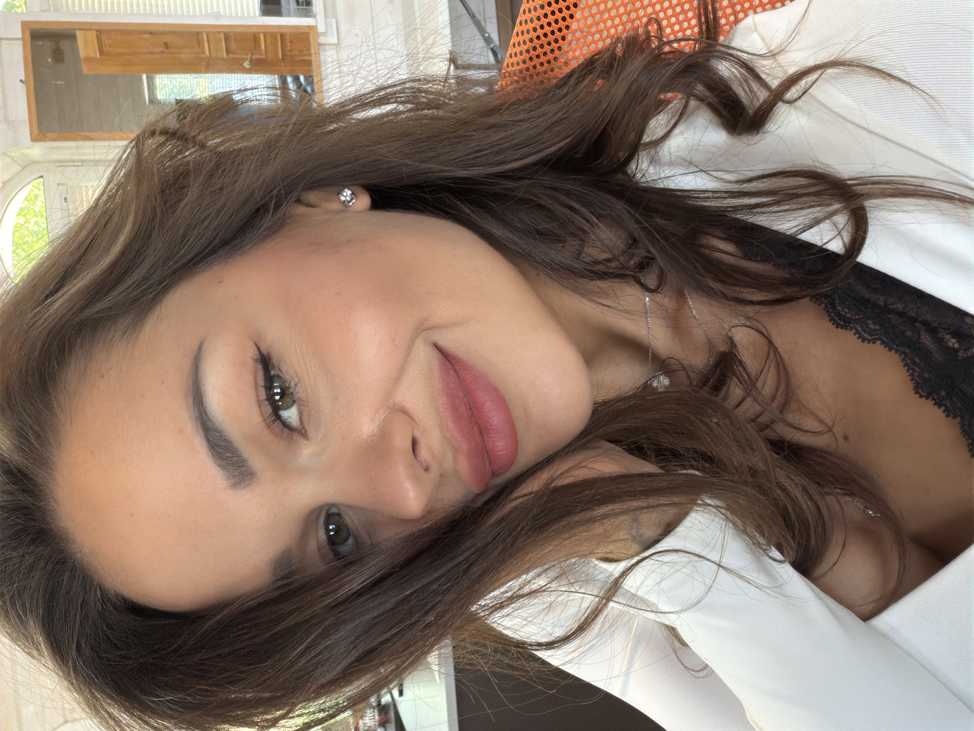 Woman takes selfies indoors in Saint Petersburg