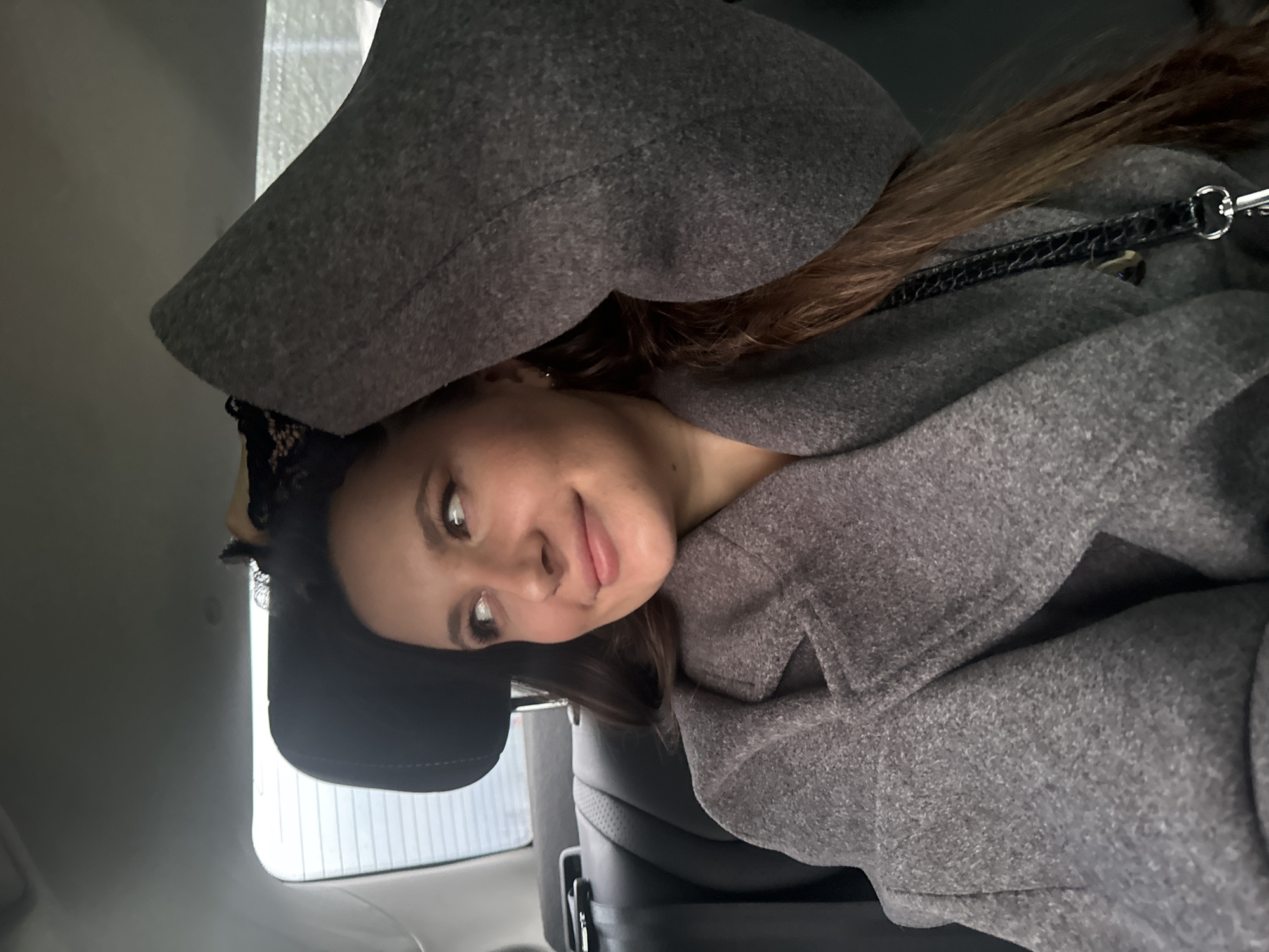 Woman in vehicle, plane overhead captured in Odintsovo