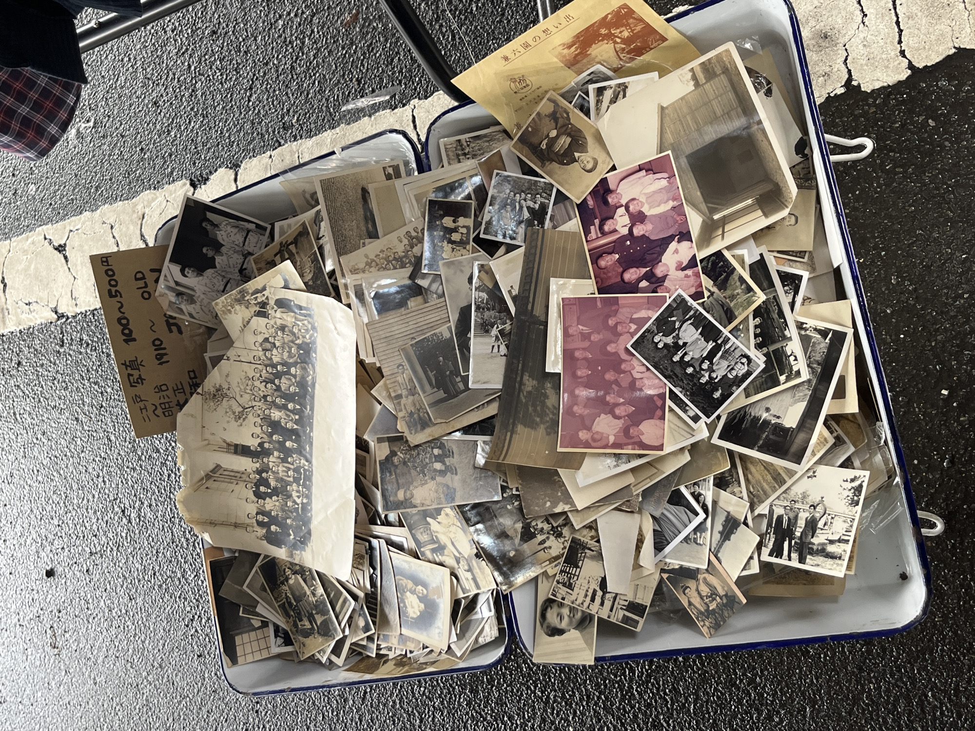 Vintage Japanese photographs discovered in enamel tray in Shinagawa