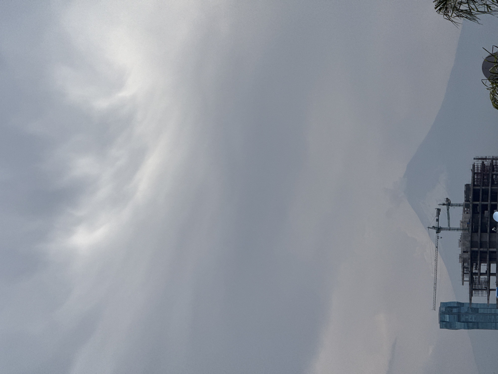 Construction site documented in Puebla, Mexico under cloudy skies