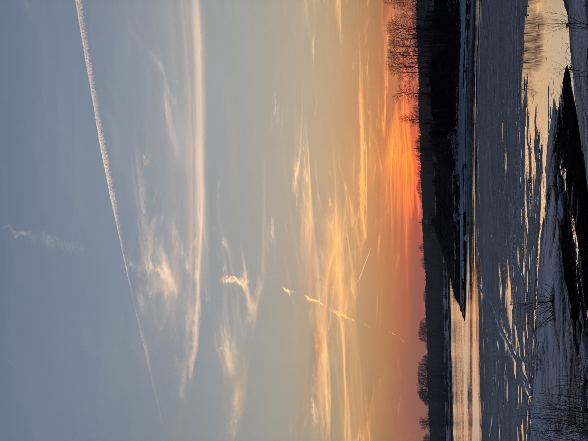 Sunset photography session documented along waterway in Chaikovsky, Russia