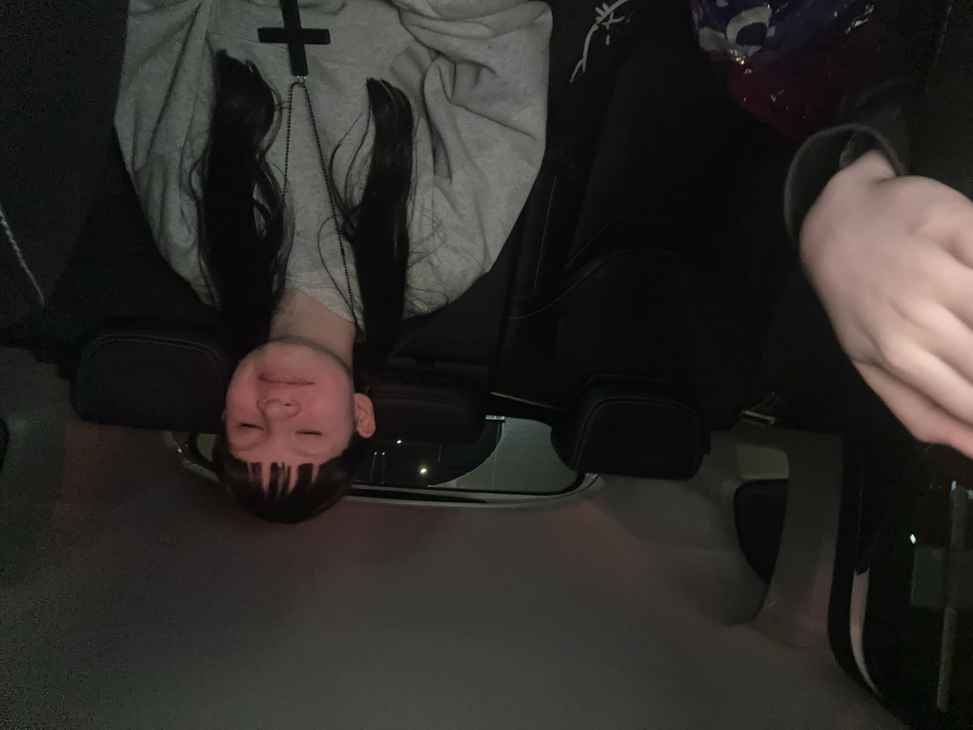 Night car journey through Moscow traffic captures passengers, landmarks