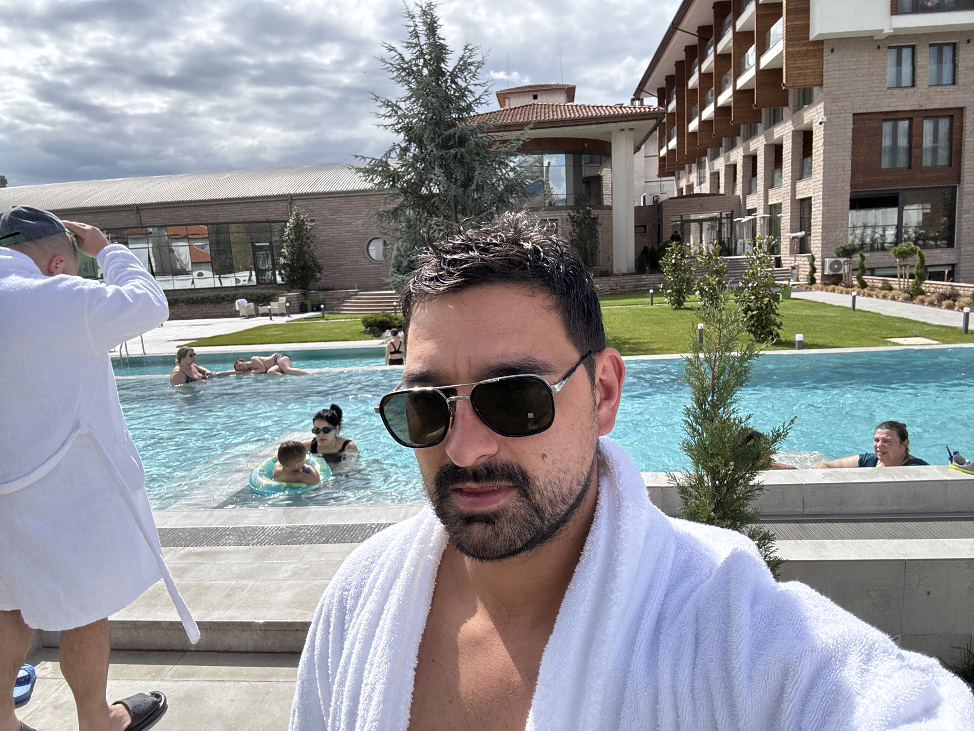 Tourist takes selfie at Bulgaria resort pool