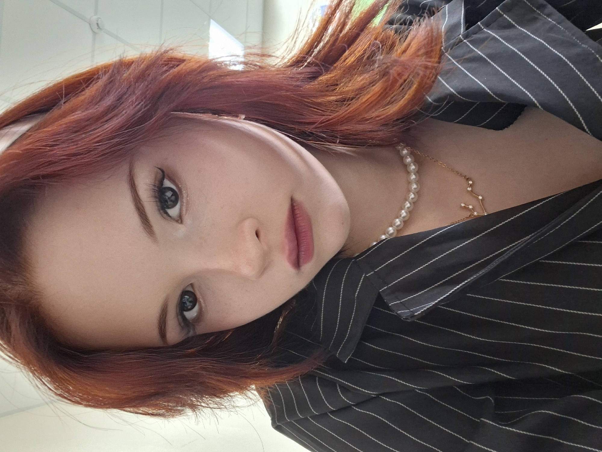 Portrait session of red-haired woman documented in Chaikovsky