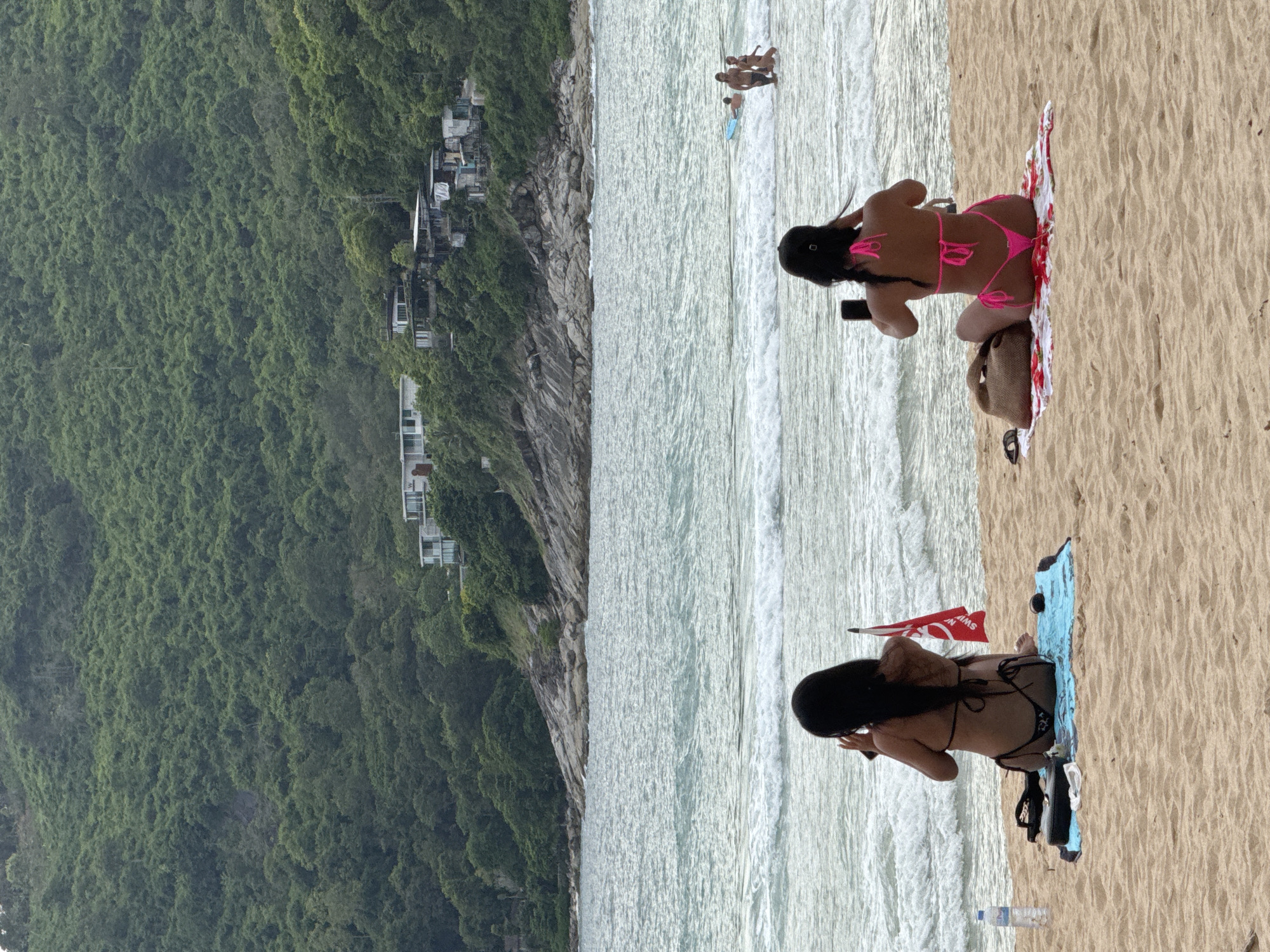 Rawai Beach morning: kitesurfing, sunbathers, and everyday shoreline life