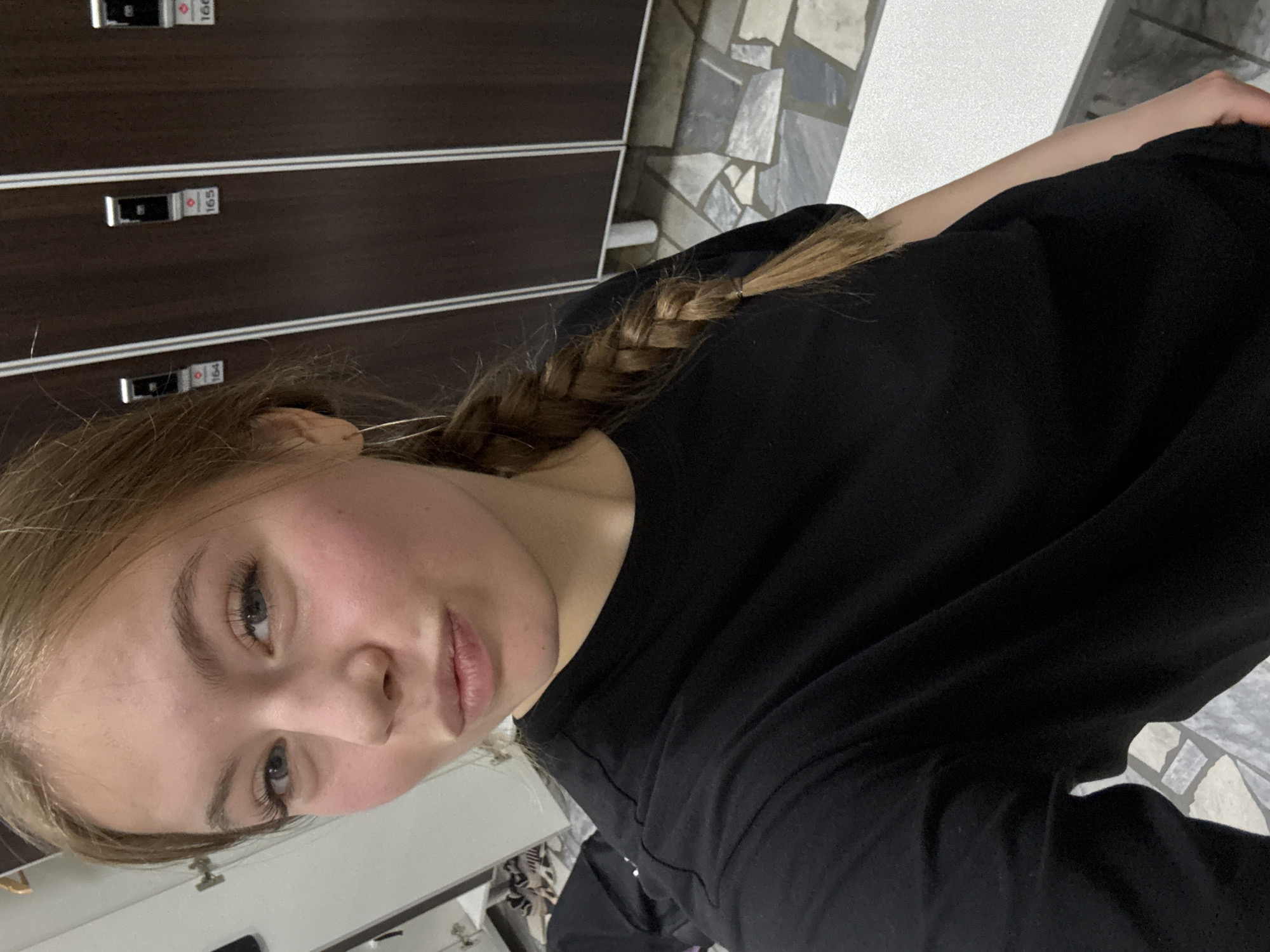 Woman takes mirror selfies in changing room, Chaikovsky