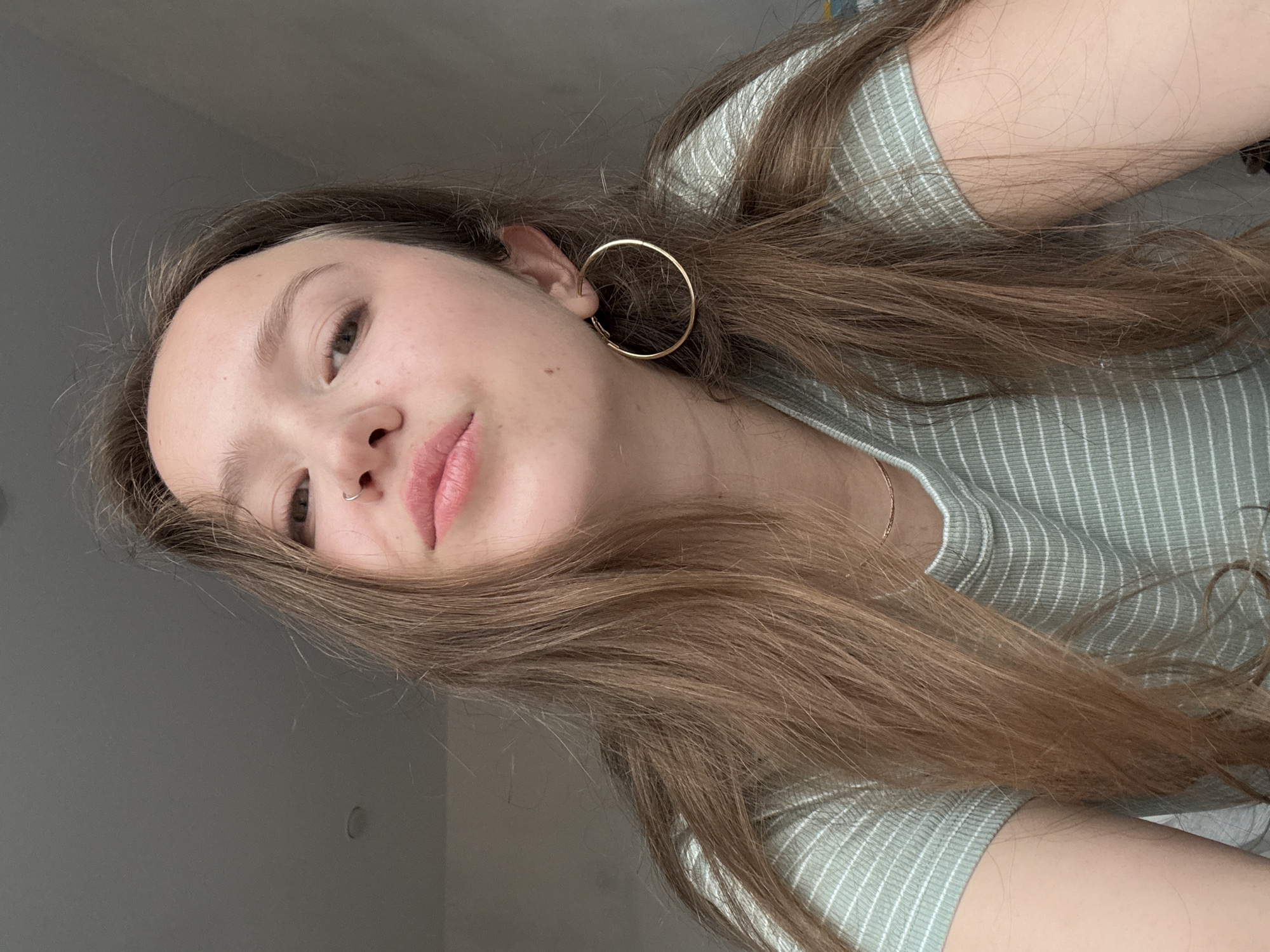 Woman takes morning selfies with cat in Izhevsk