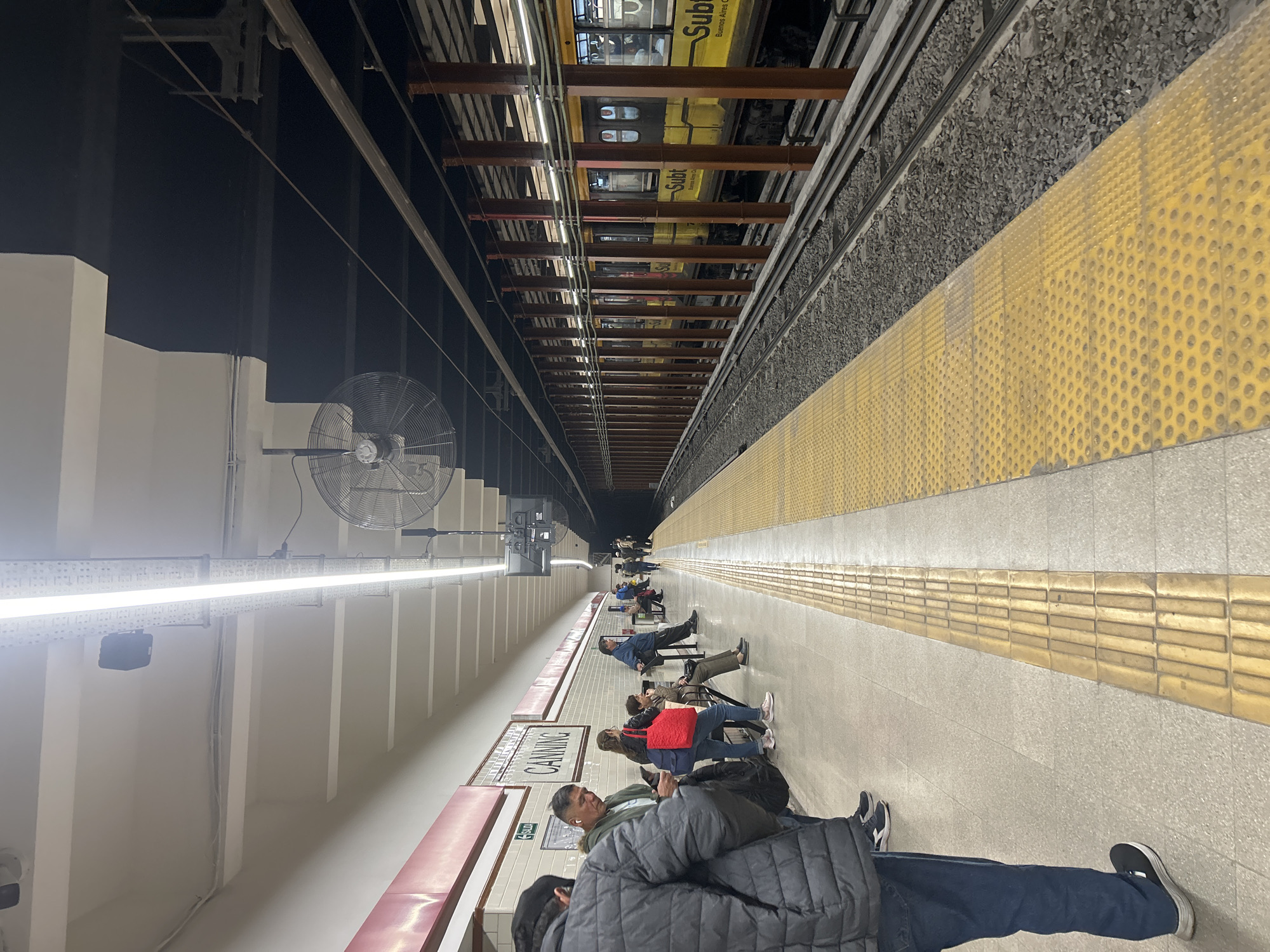Person takes selfie at Buenos Aires subway station