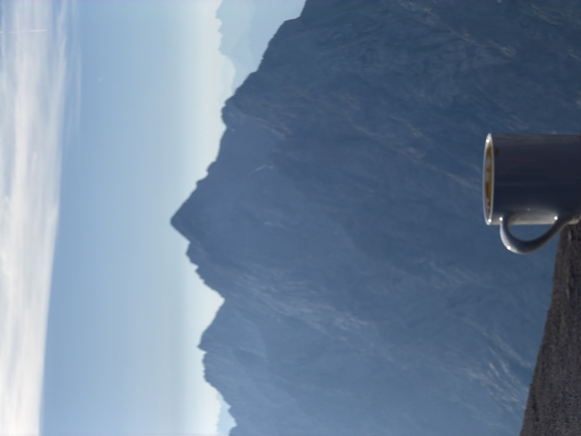 Morning coffee at a high-altitude cable car station in the Alps
