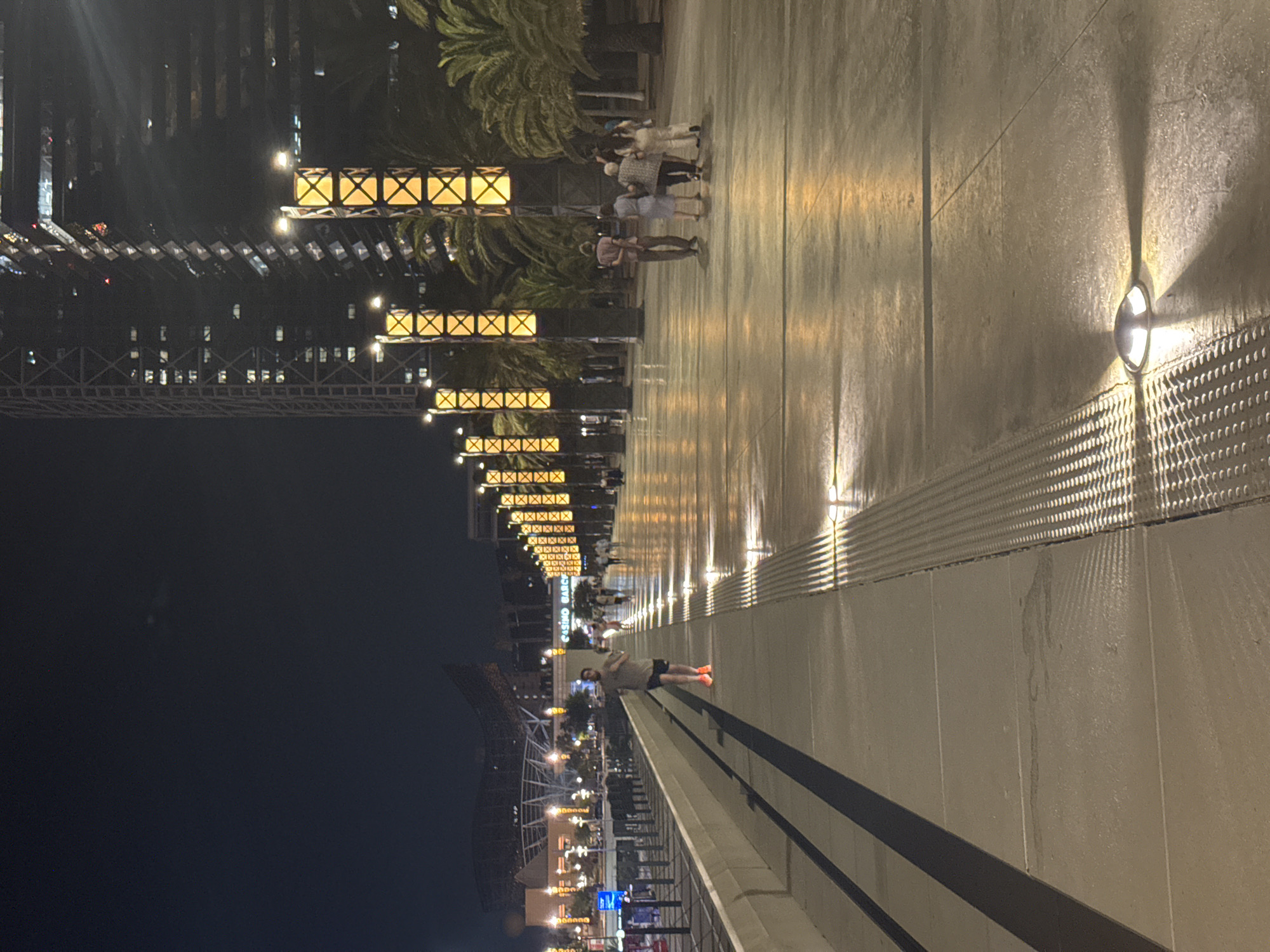 Night stroll along Barcelona's Port Olímpic marina promenade