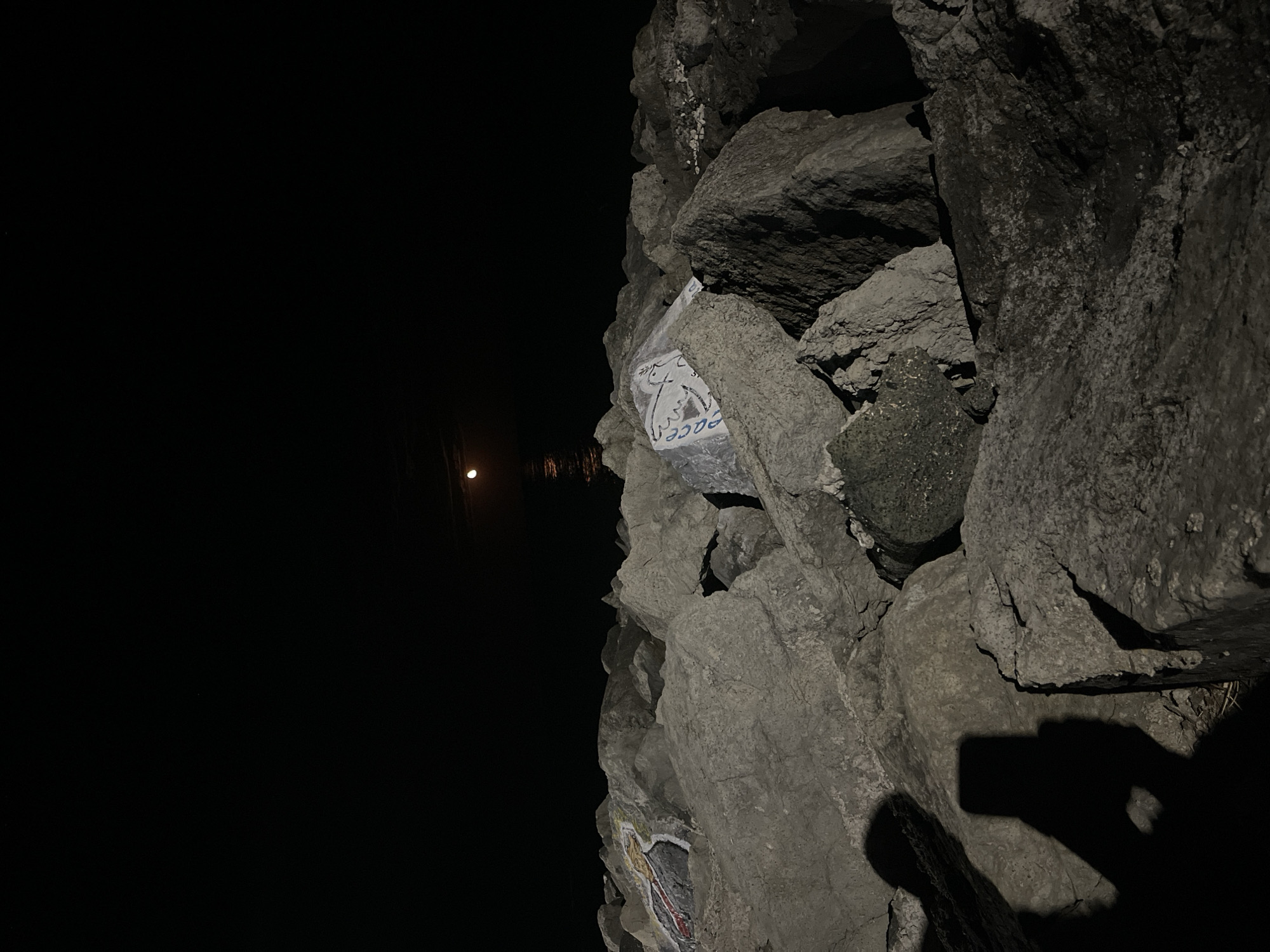 Painted rocks and moonlight along Primorsko's Black Sea shore