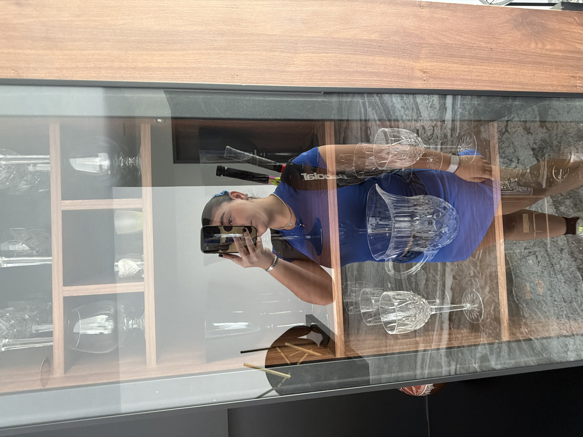 Woman takes mirror selfies in blue outfit, Puebla