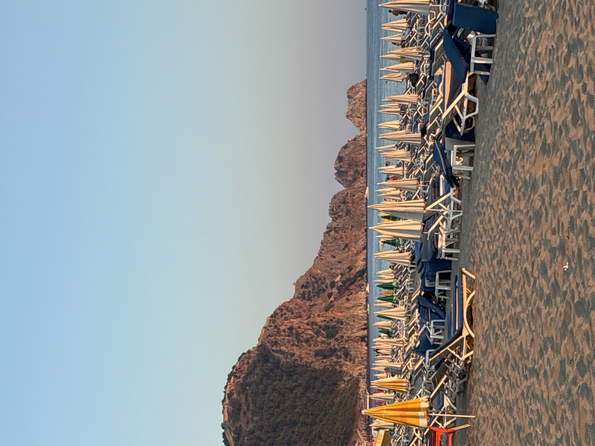 Golden hour on Alanya's beach and promenade, July evening