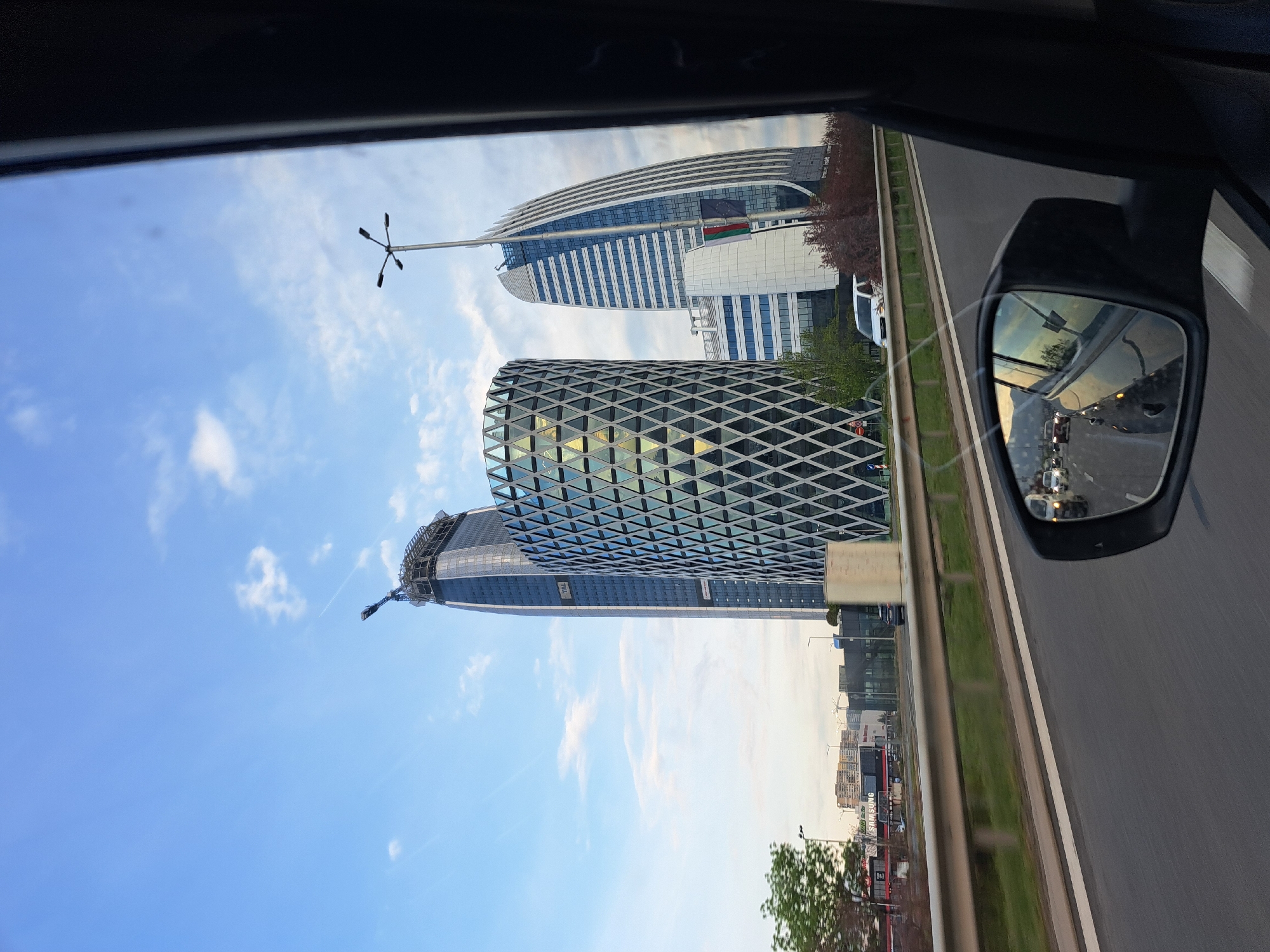 Vehicle captures urban skyline views on highway in Bulgaria