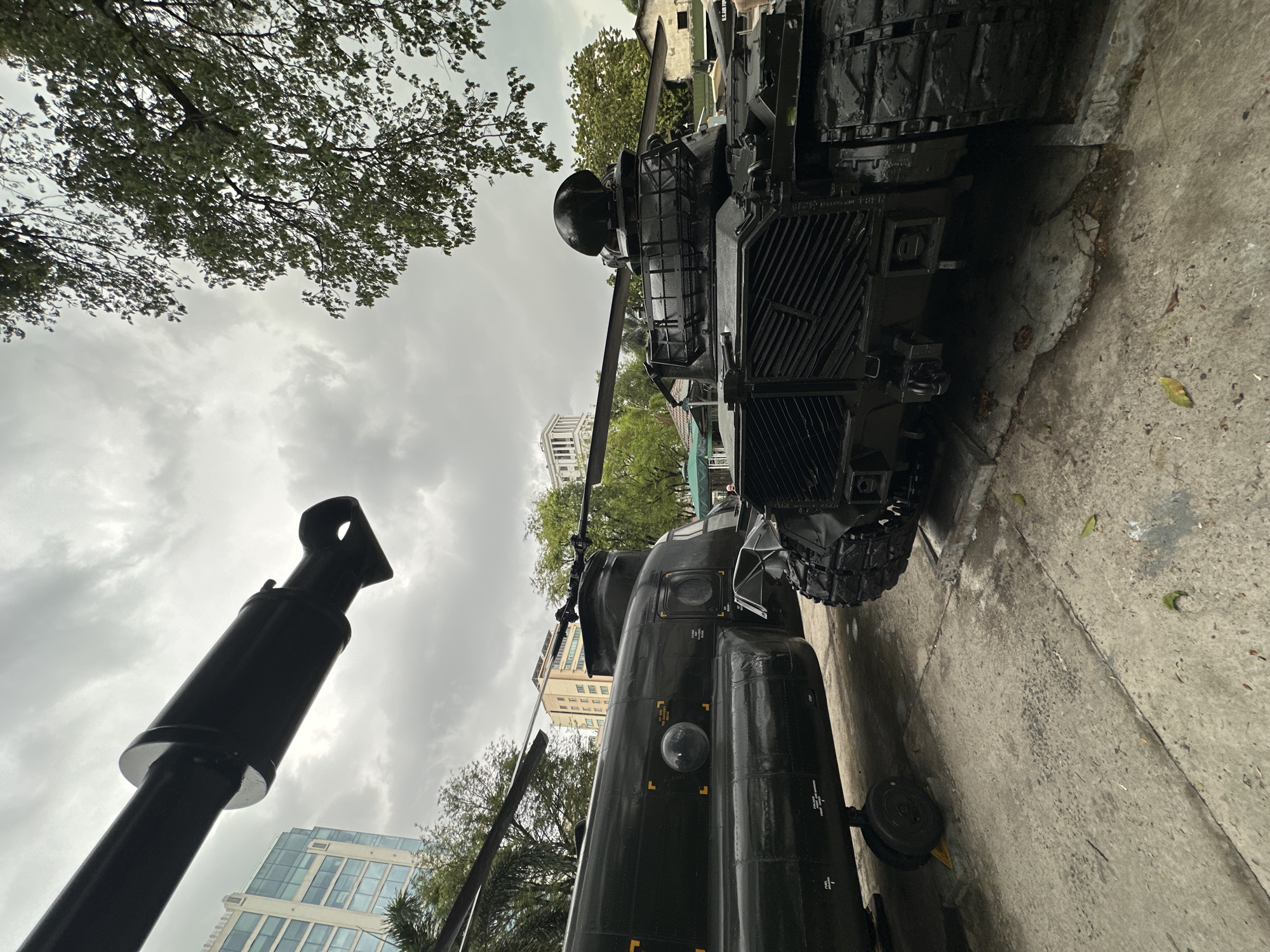 Military vehicles displayed at outdoor museum in Thủ Đức