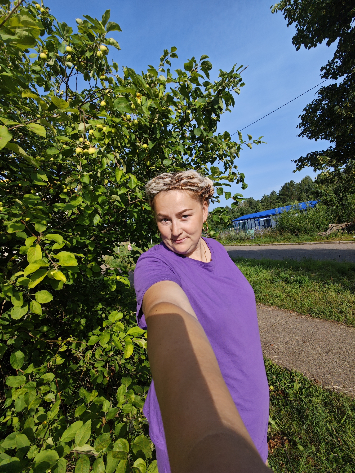 Casual summer morning near a local bakery in rural Russia