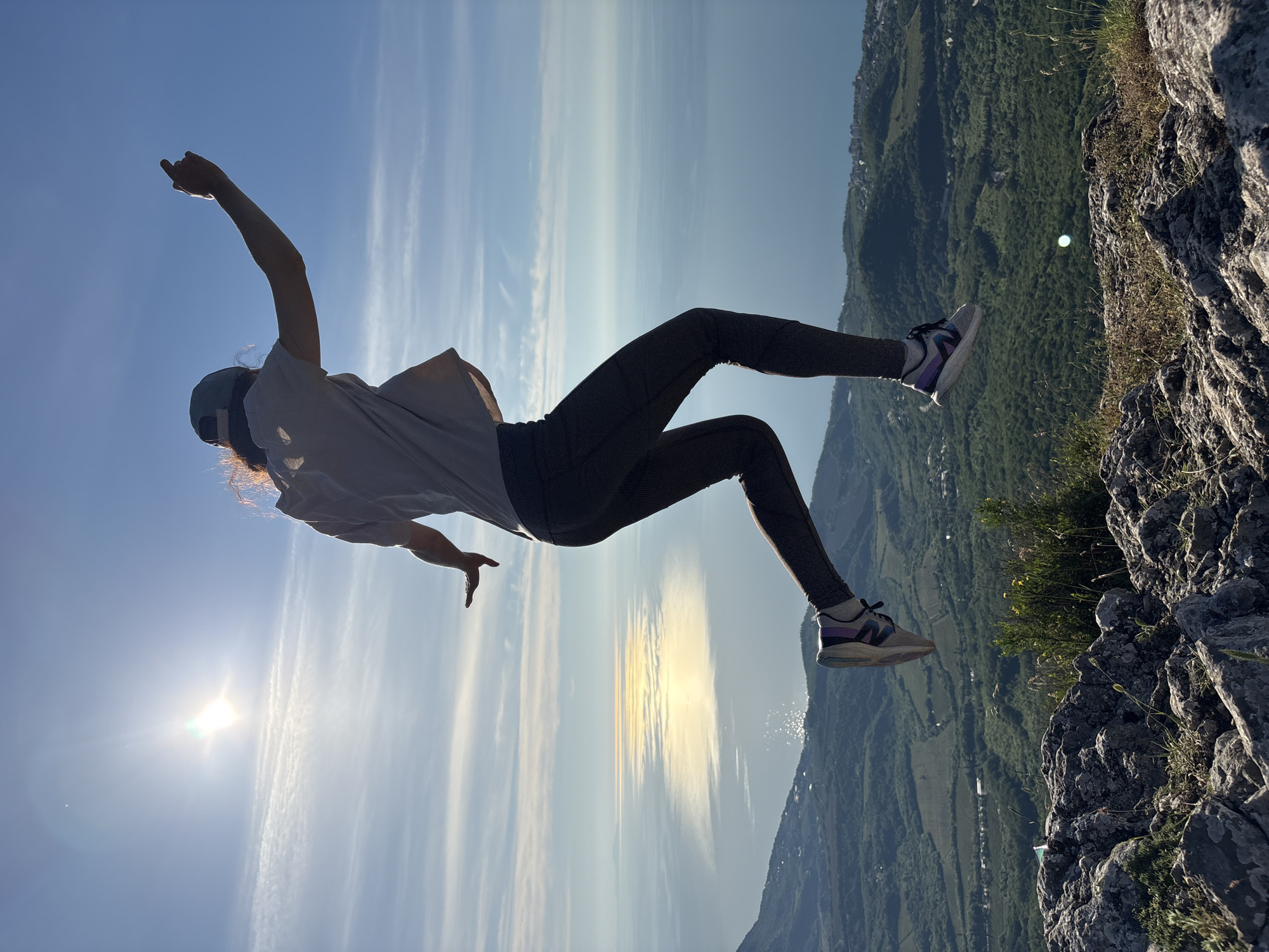 Person jumps at sunrise over Ukrainian coastal landscape