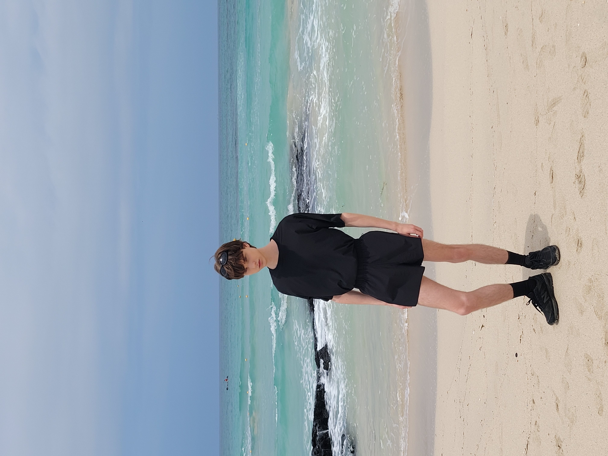 Beachside pause on Jeju's sandy shore